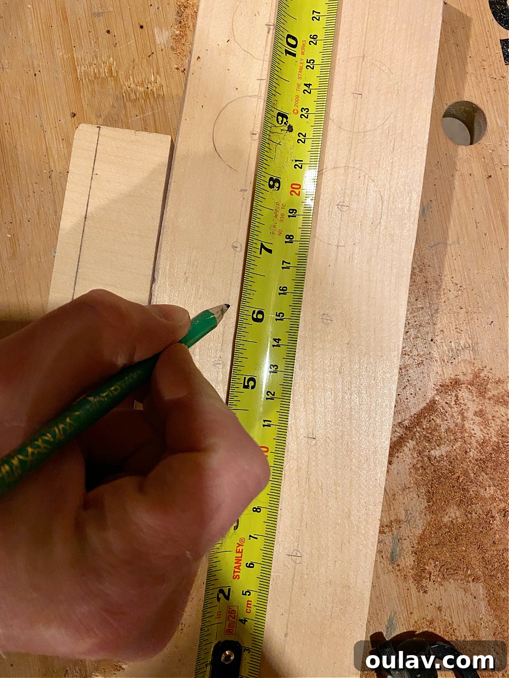 Close-up of the marked guide points, ready for drilling the pilot holes.