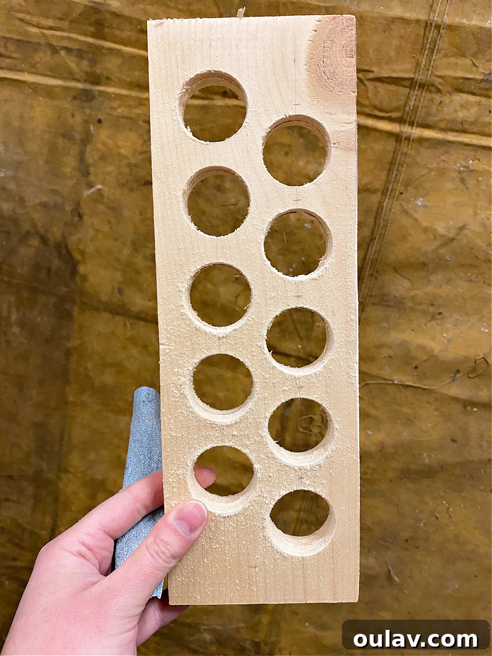 Simple Wood Egg Tray Build 19 scrap wood project - The wooden tray undergoing sanding to smooth all edges and surfaces, ensuring a refined finish.