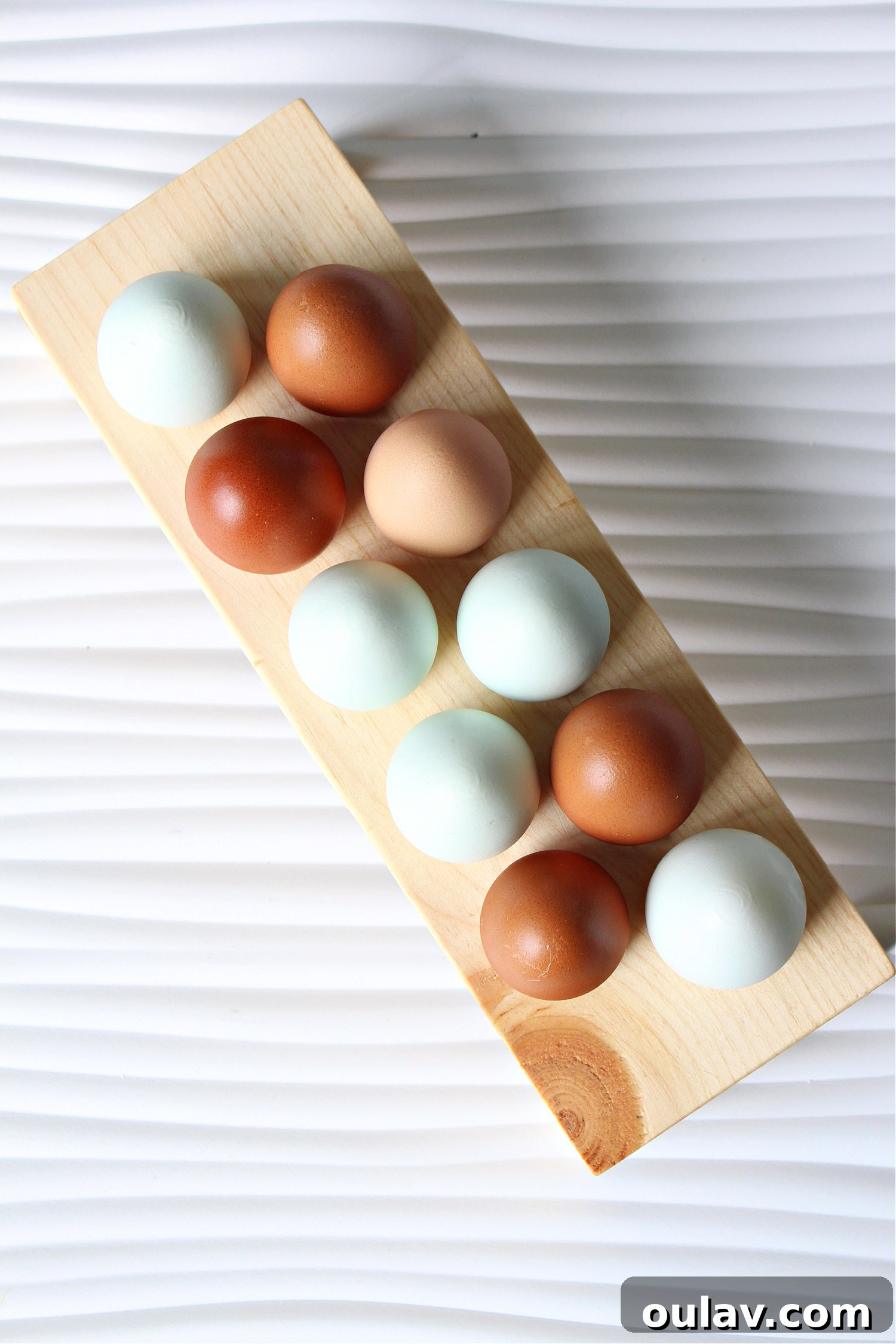 Solid wood egg holder - A sturdy and elegant wooden egg holder, showcasing the natural beauty of solid wood.