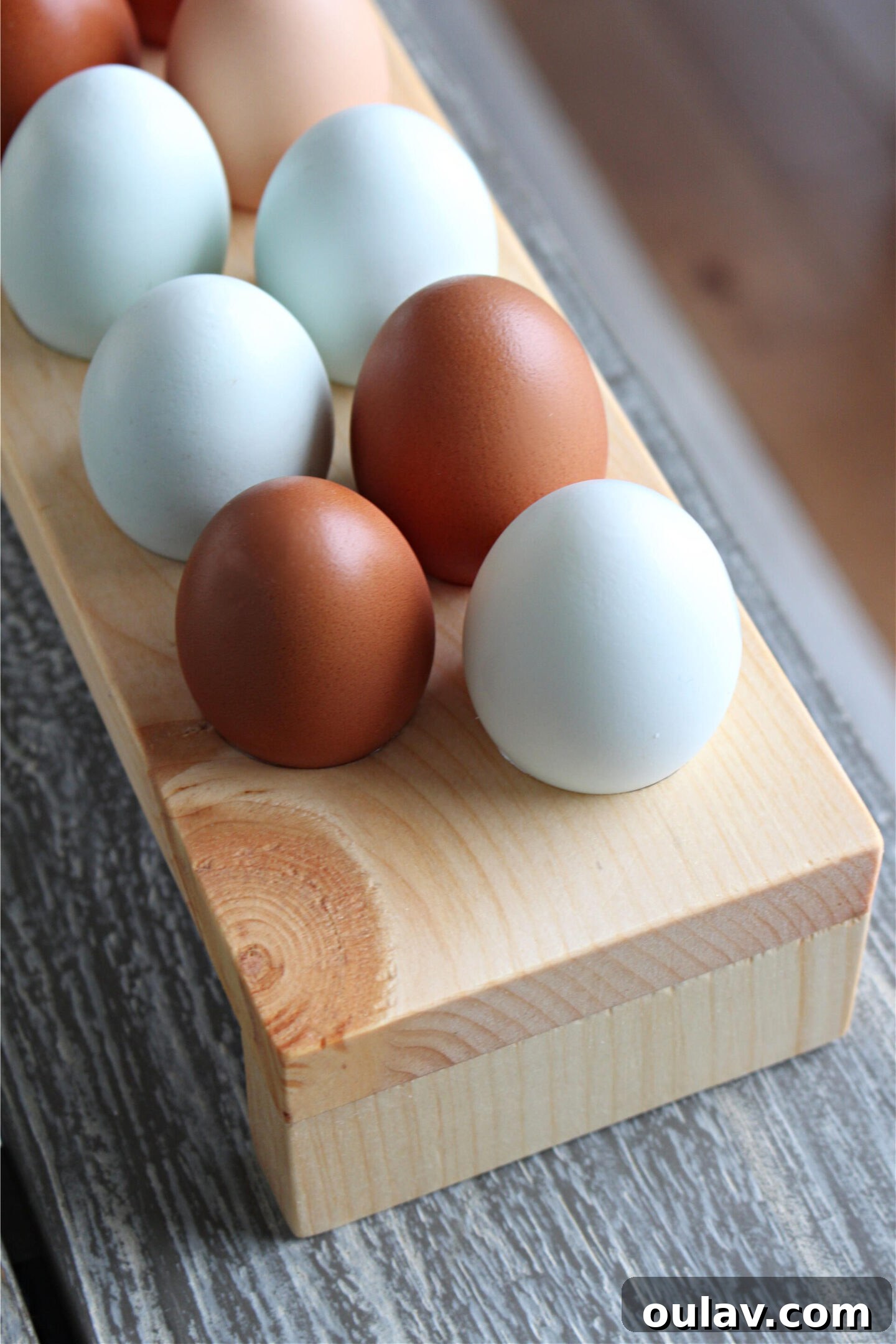 How to make an egg tray - The finished wooden egg holder sitting elegantly on a kitchen surface, ready to be filled.