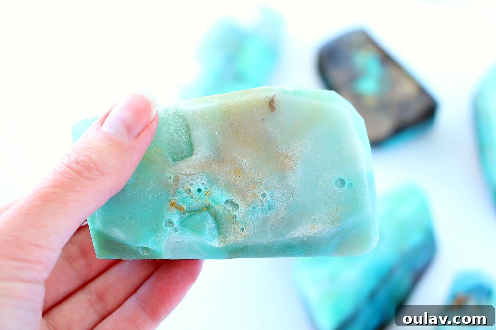 Handcrafted soap rocks cut into various gem shapes, showcasing a beautiful turquoise color with natural veins