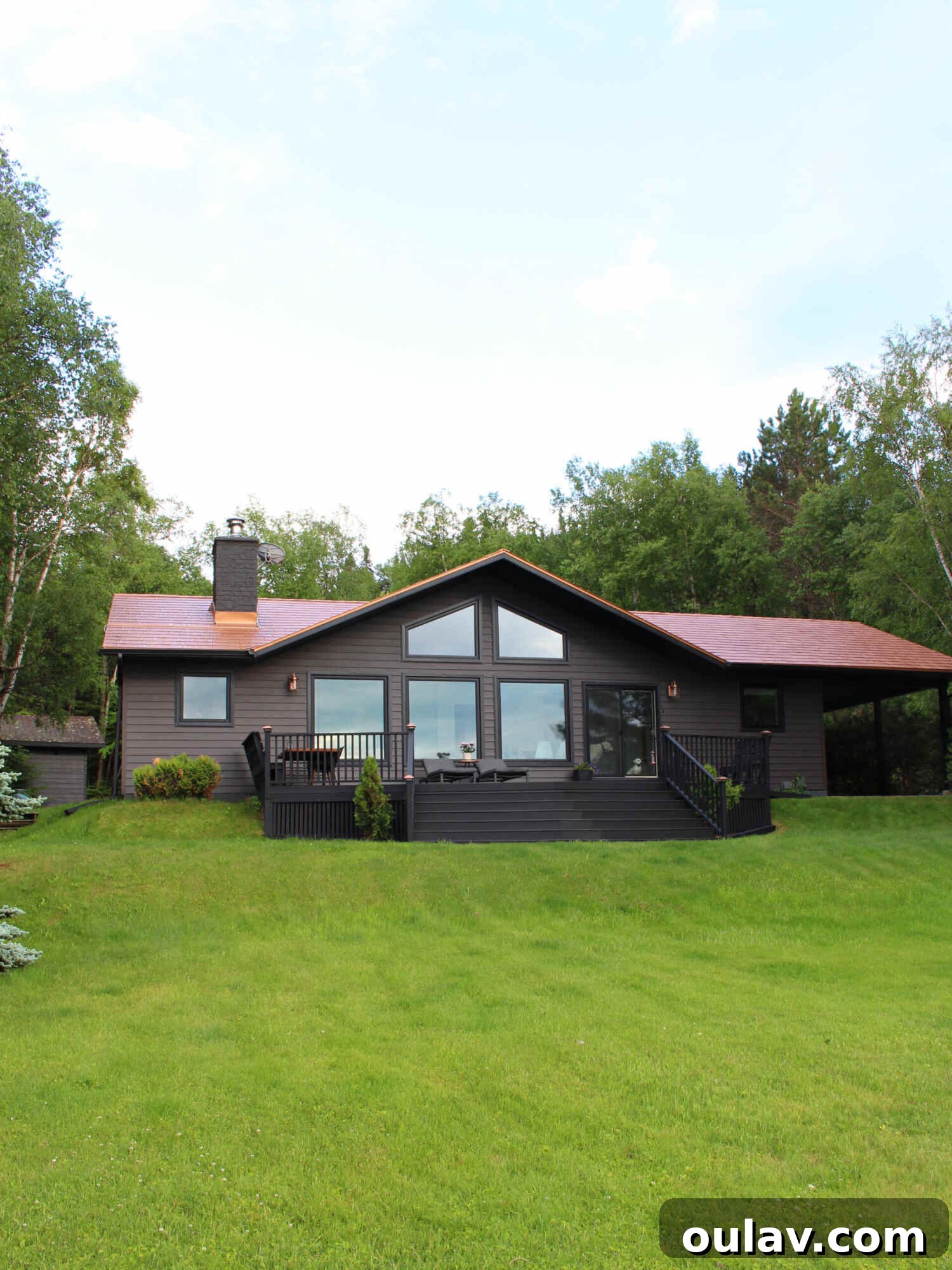 Unveiling Our Lake House Outdoors 9 Transformed Lake House Exterior with Copper Roof and Black Deck