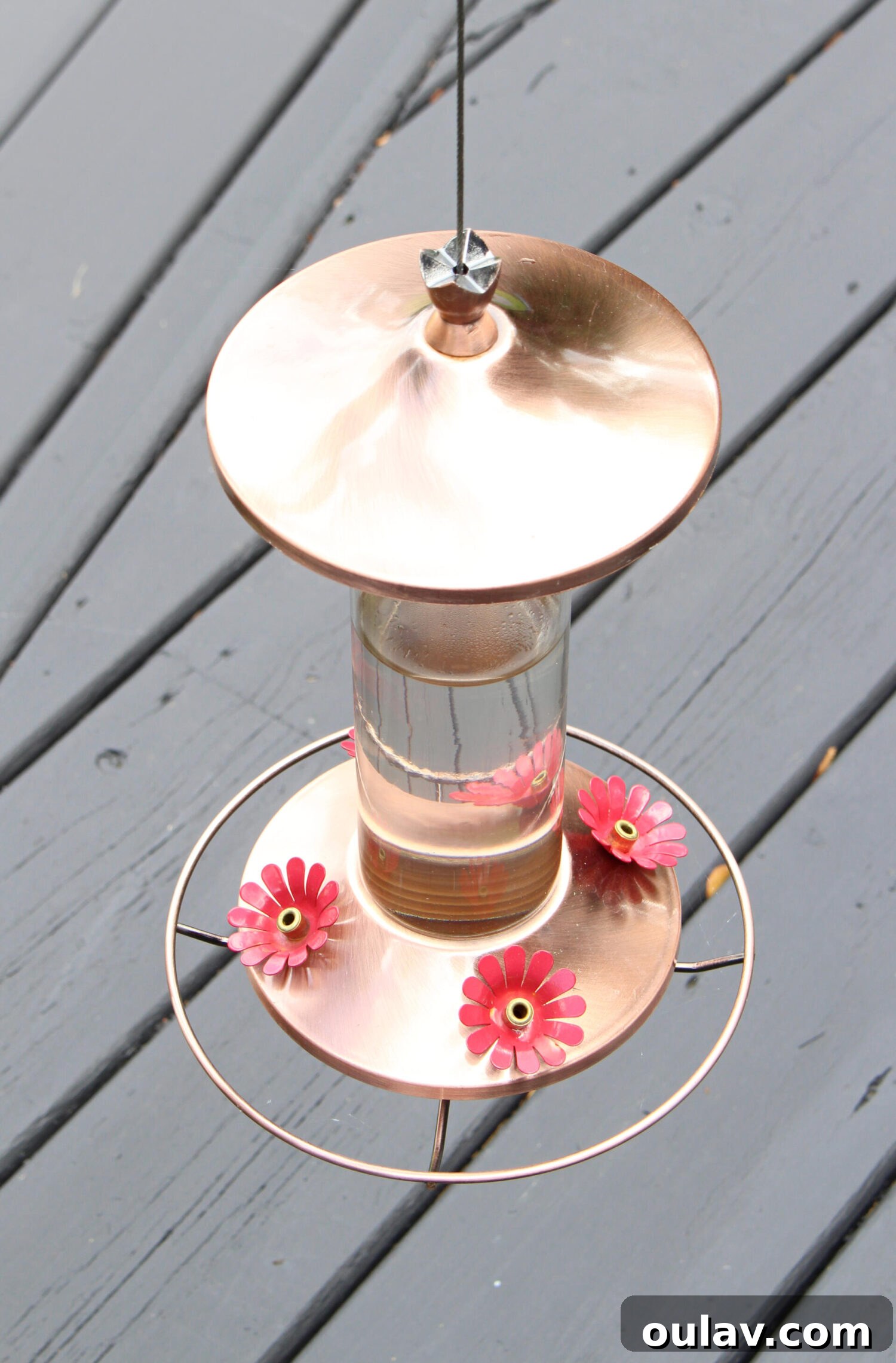Unveiling Our Lake House Outdoors 16 Modern Copper Bird Feeder Harmonizing with Copper Roof and Decor