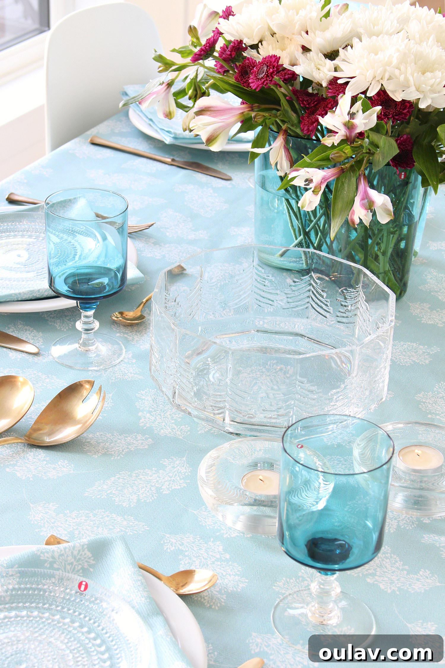 Loom and Table's Summer Dining Oasis 15 Vintage teal glasses complement an aqua and white summer tablescape