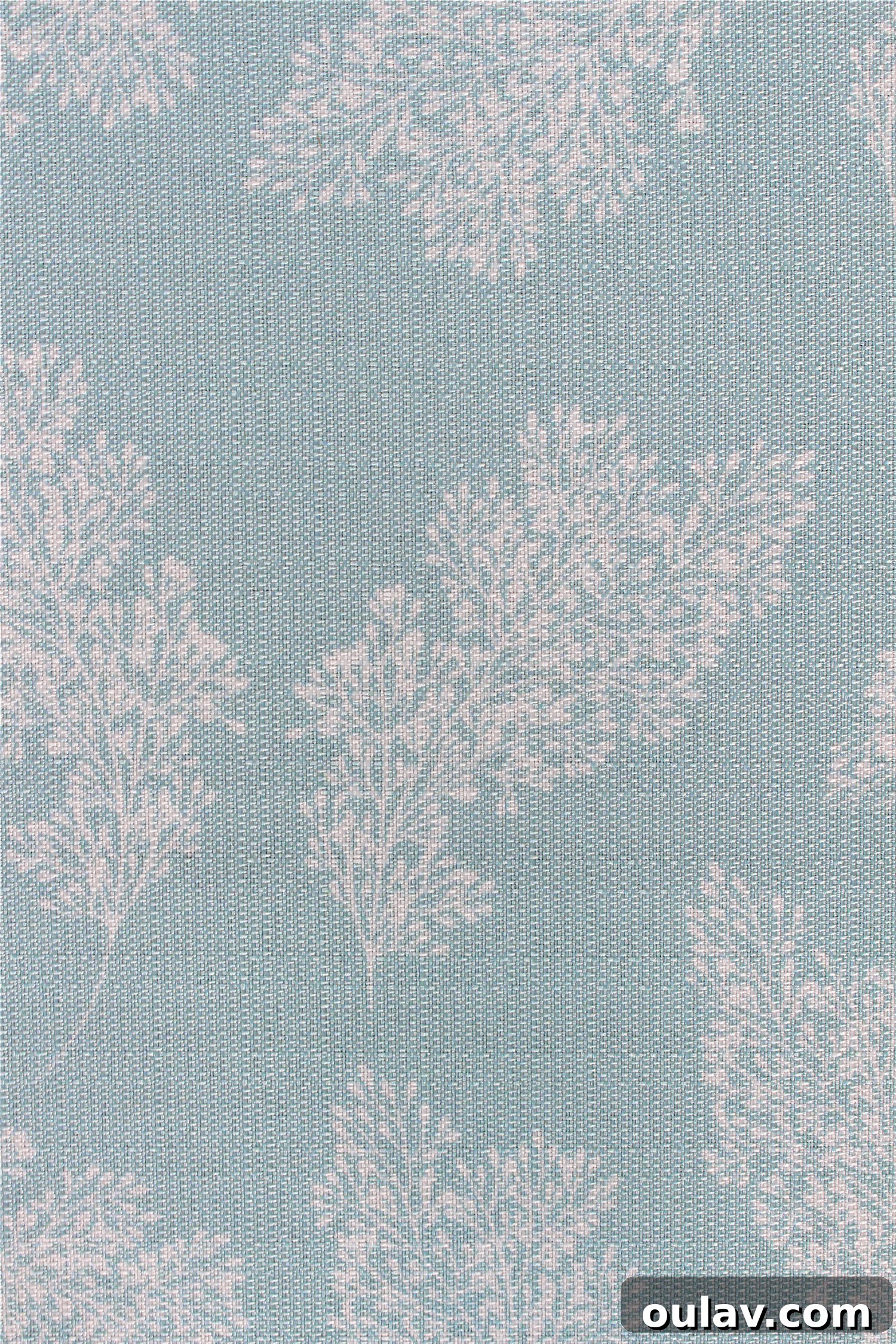Loom and Table's Summer Dining Oasis 5 Close up of aqua tablecloth pattern from Loom & Table