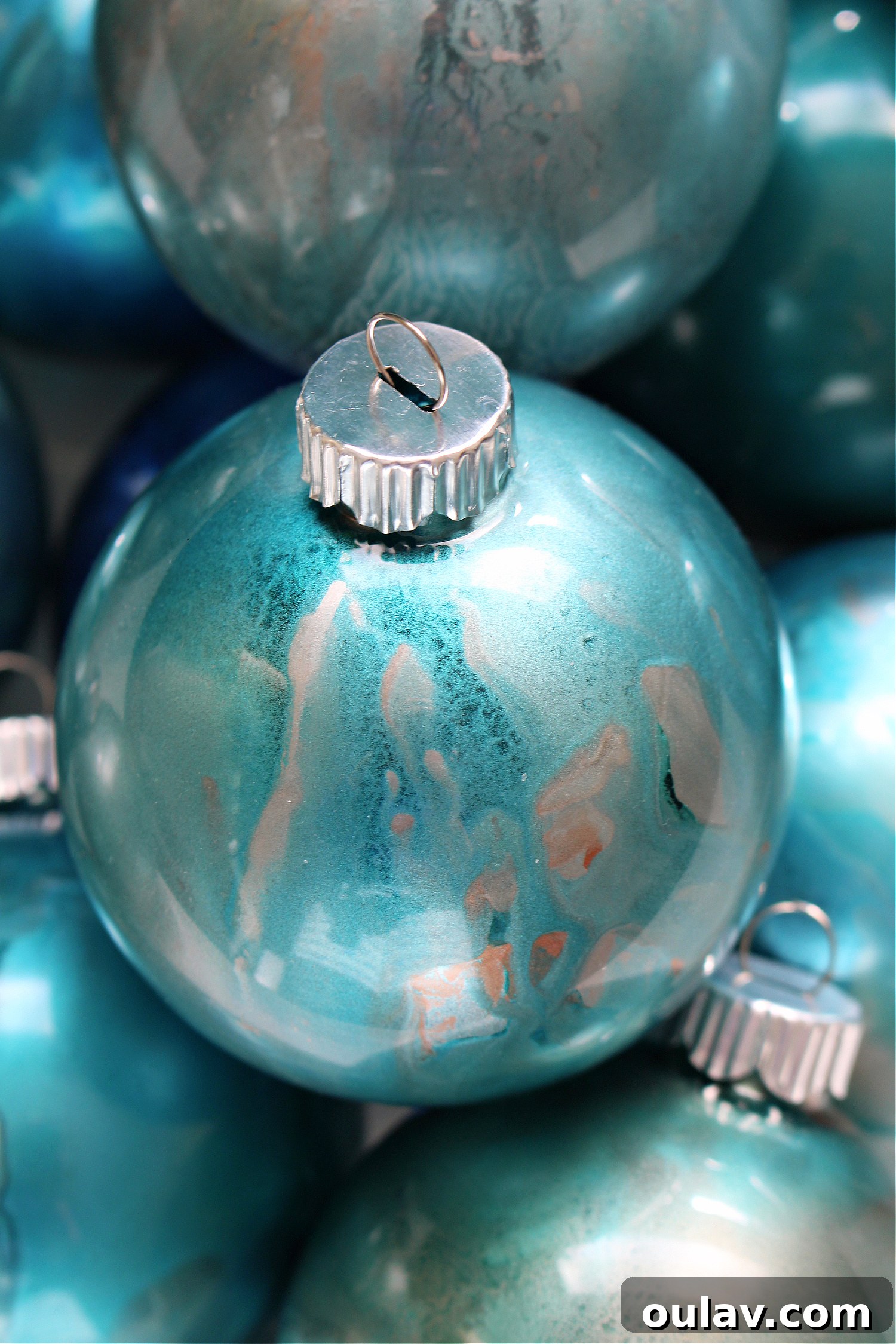 Craft Stunning Alcohol Ink Ornaments 33 DIY Christmas Tree Ornaments Showing Alcohol Ink Patterns