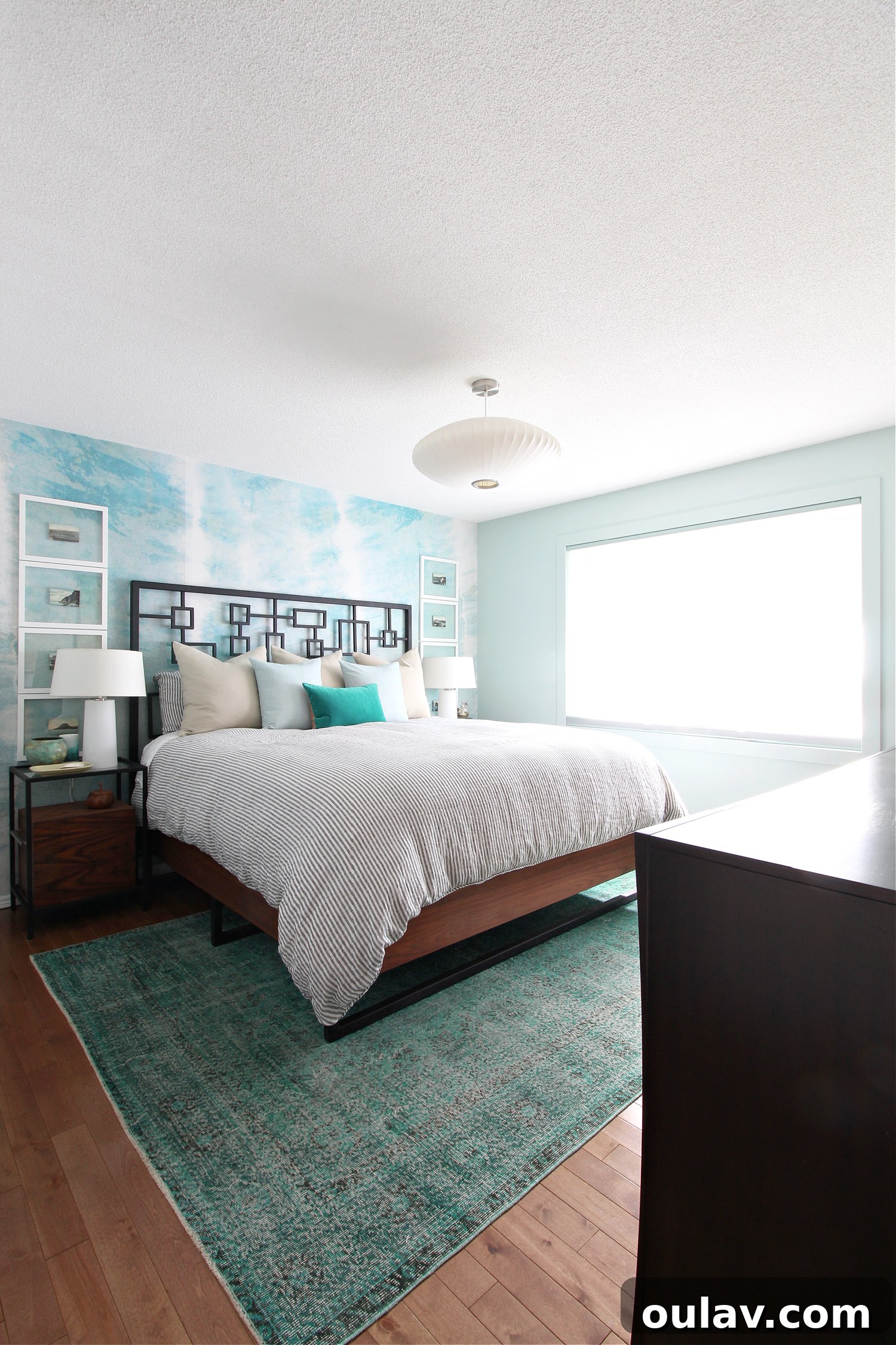 The Bedroom's Style Journey 24 Bedroom featuring the bold tie-dyed mural, 2021
