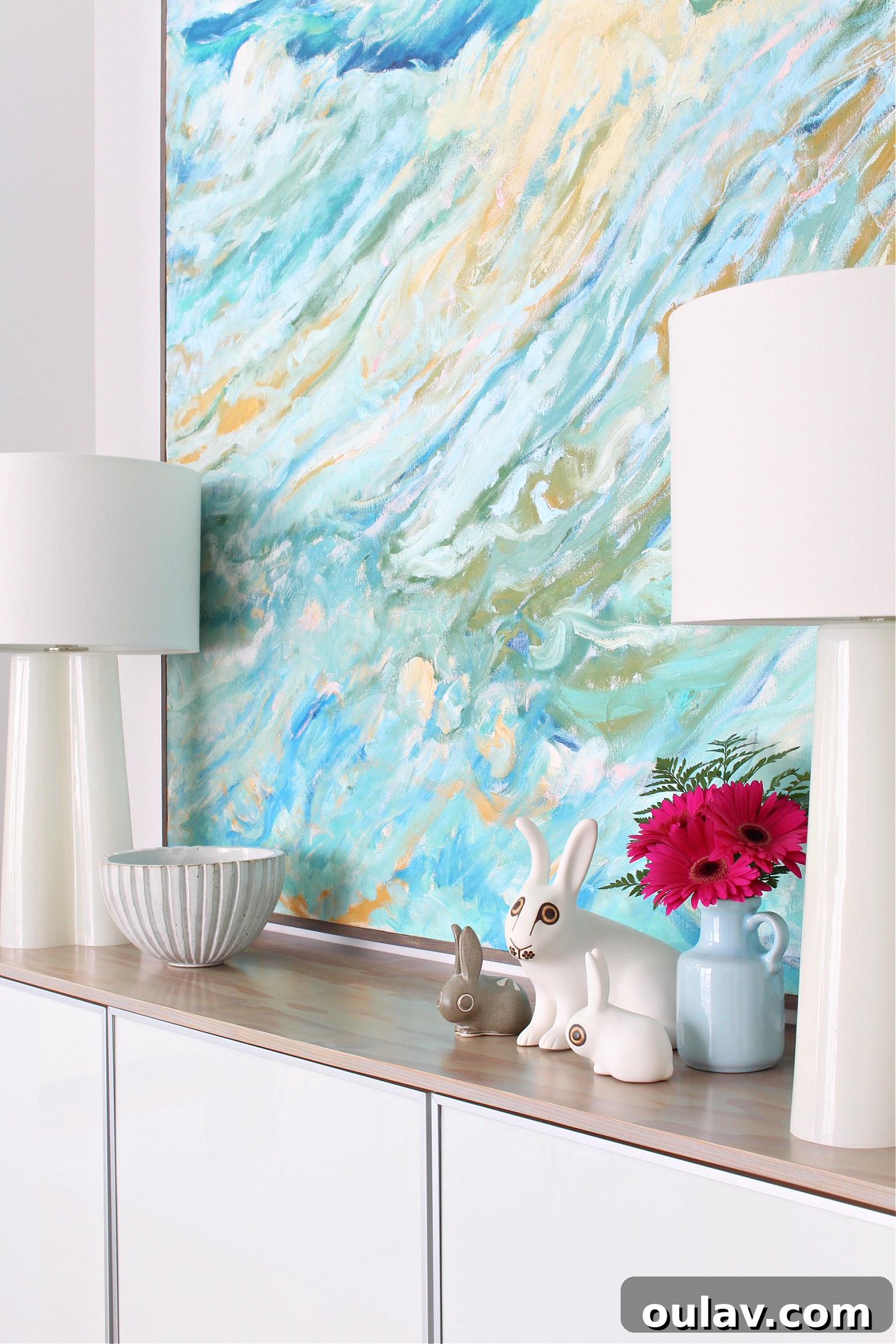 Thrifted Blooms: Vintage Charm for Your Spring Dining Room 13 Spring Credenza Decor with Vintage Bunnies and Pottery