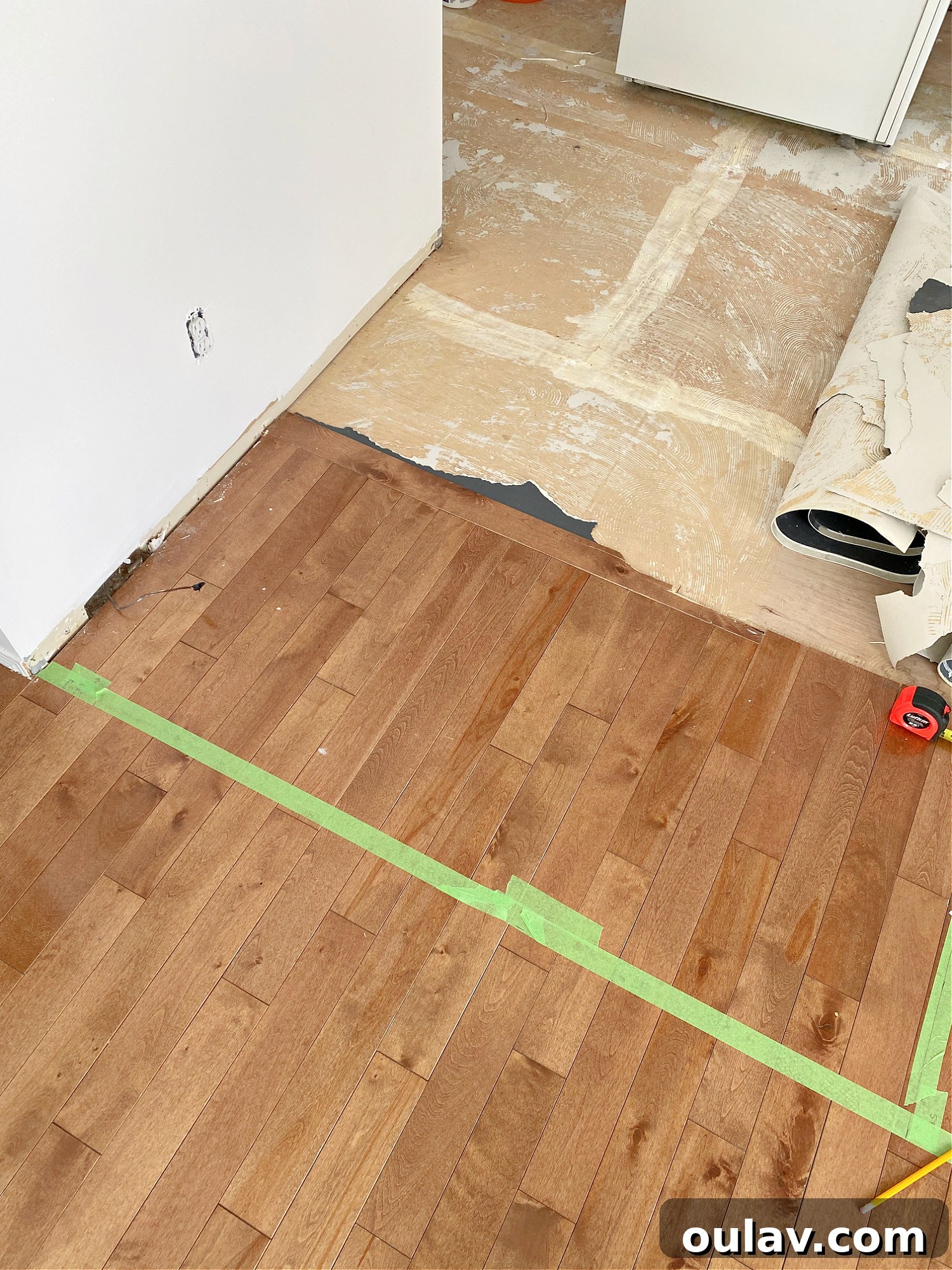 Widening the Kitchen Space by Cutting Hardwood Flooring