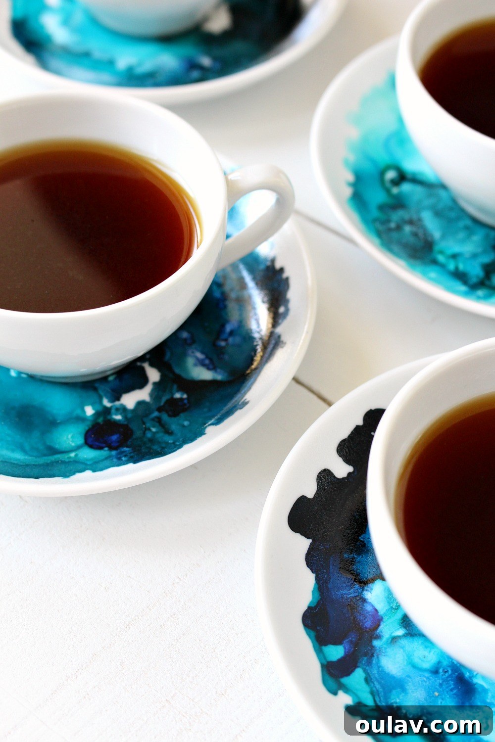 Creating Vibrant Ceramics with Alcohol Ink 4 Marbled saucers created with vivid alcohol ink designs