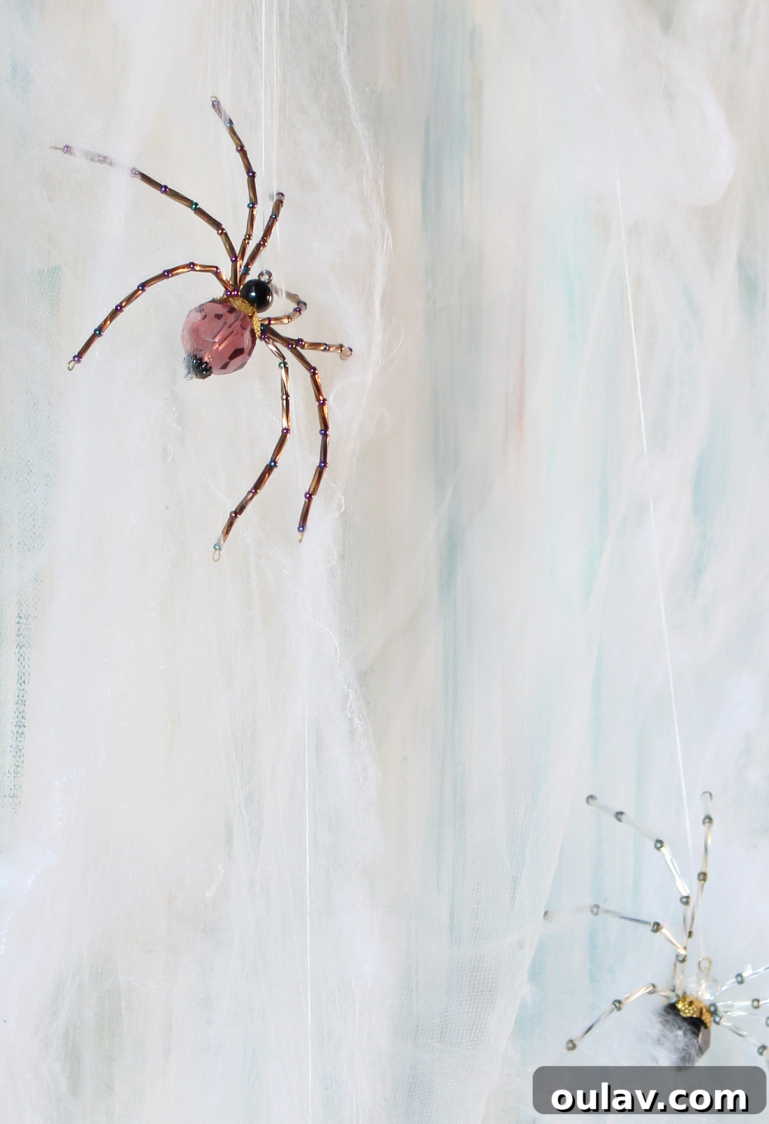 Eerie Elegance: DIY Spiderweb Halloween Mantel 9 Beaded Spiders Elegantly Integrated into Halloween Decor