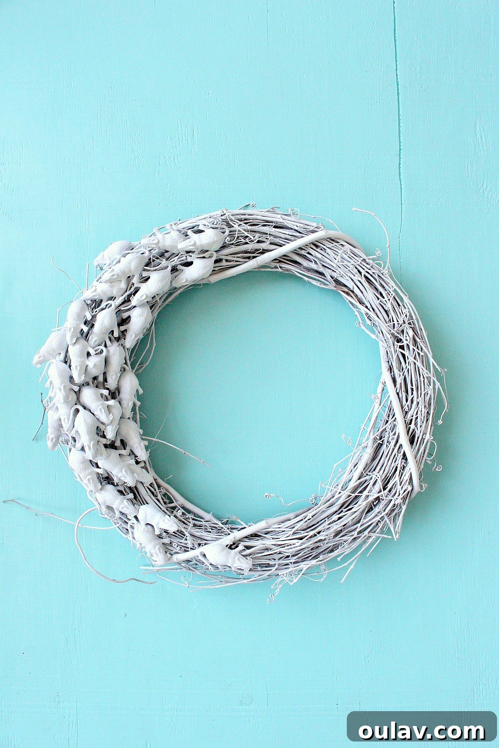 Modern Halloween Decor: DIY and Buy Smart 12 Modern Halloween Decor Idea: Monochrome Ghost Wreath DIY