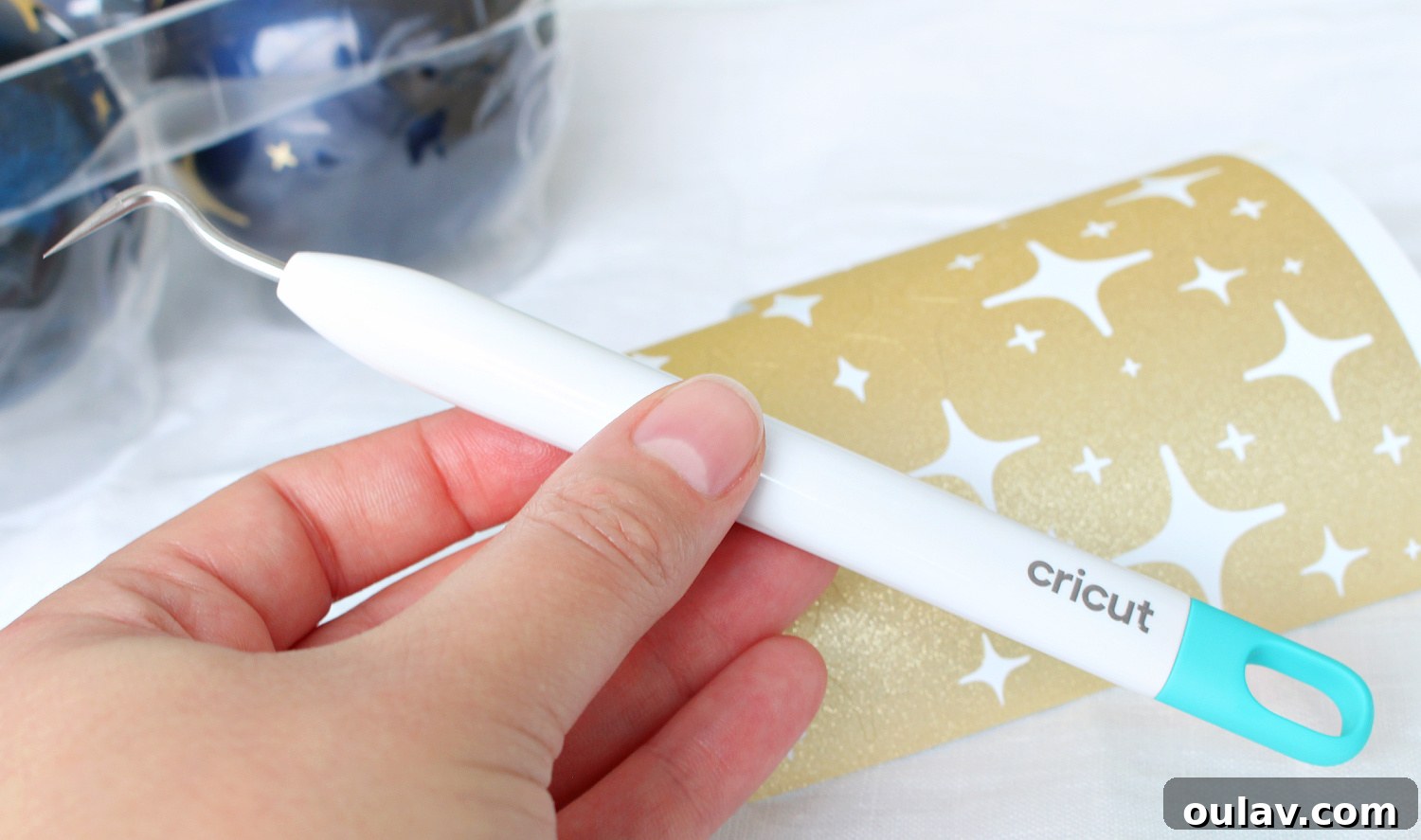 Cricut Starry Night Ornament Project 10 DIY Cricut Christmas Ornament Tutorial applying stars