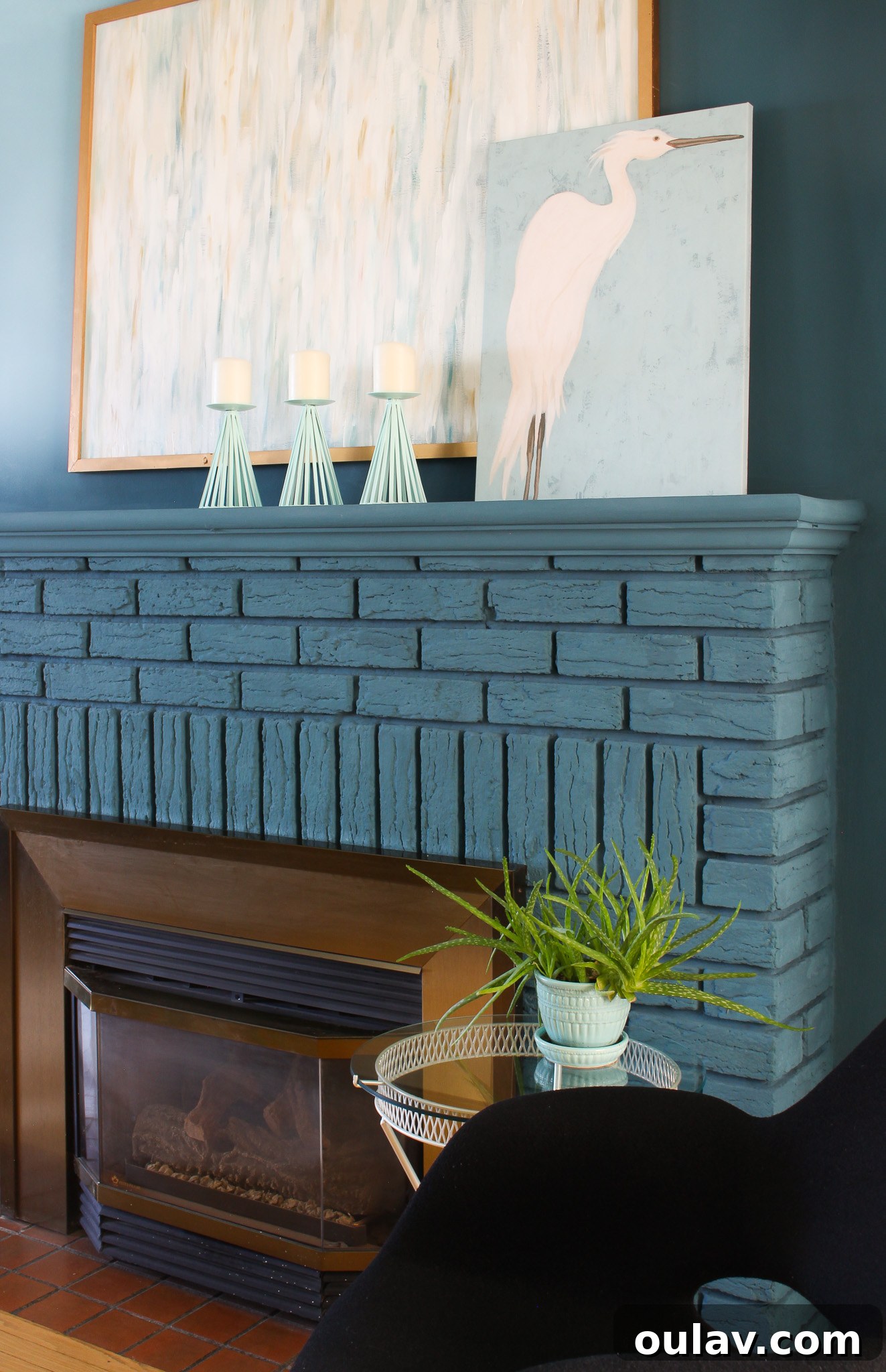 A Source for Coastal Art - Heron Fresco print on a fireplace mantel