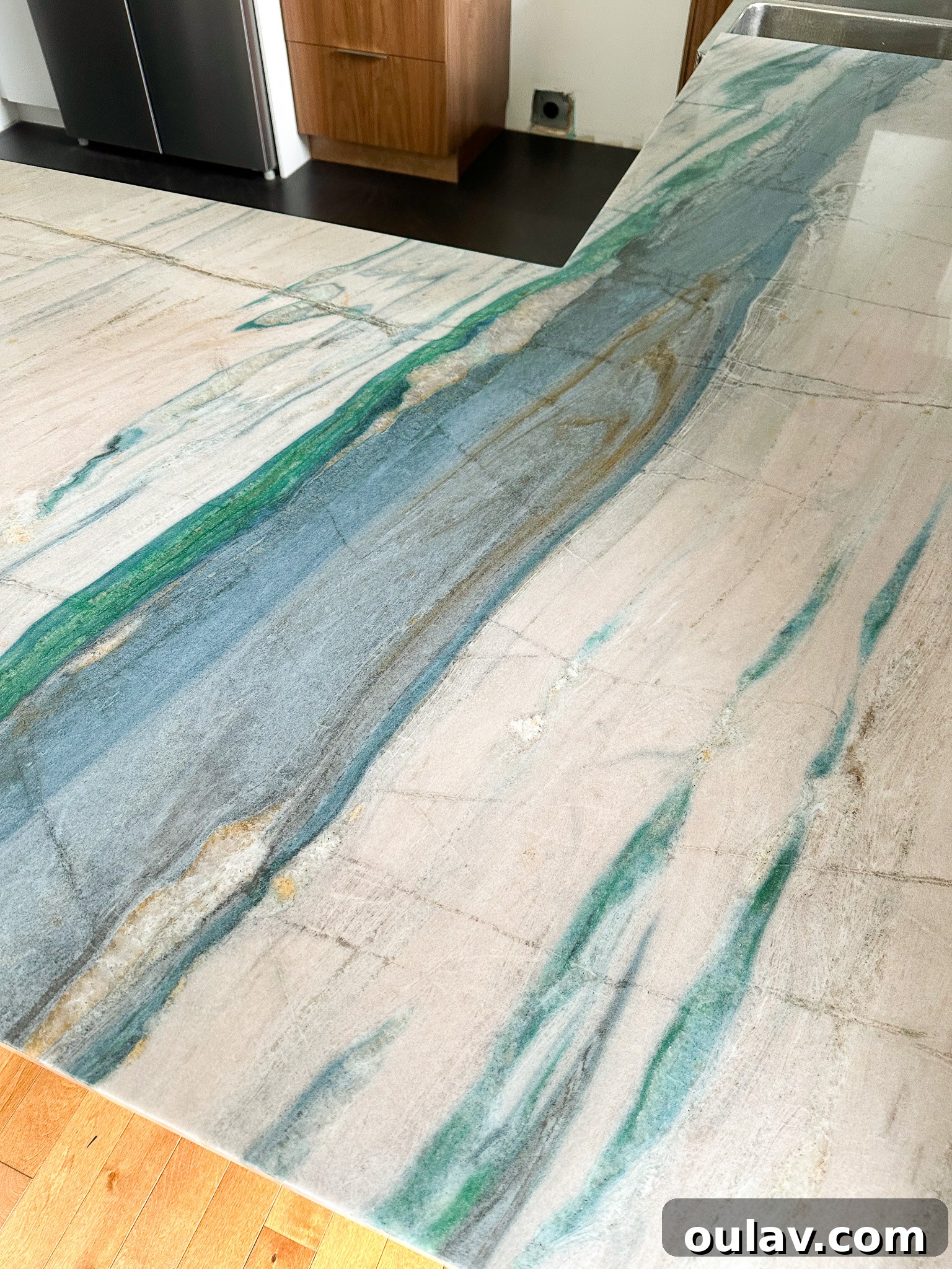 Overall view of the new Portomare Quartzite kitchen counters with a cohesive veining pattern