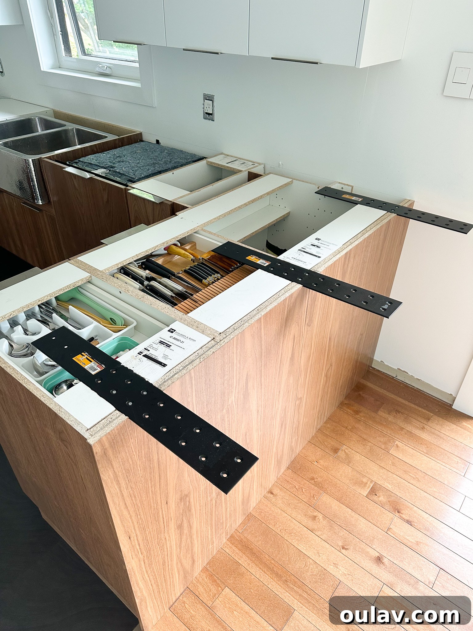 My Kitchen's Stunning Quartzite Transformation 5 New stone counter support bracket installation, ensuring stability and safety for the overhang