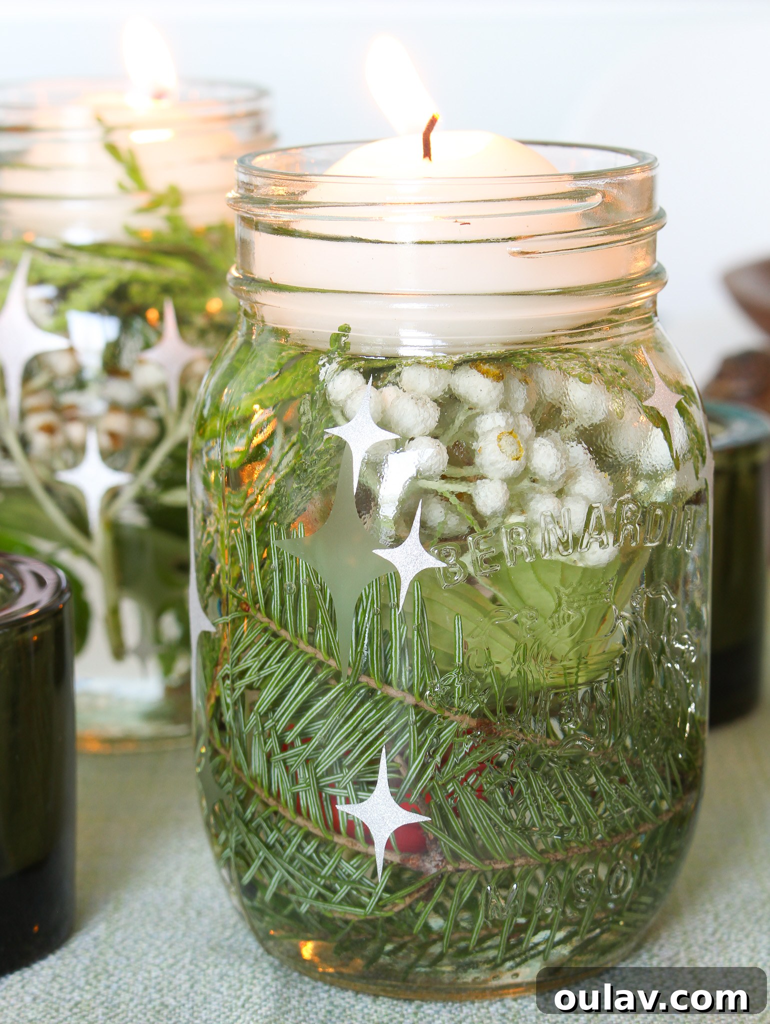 Stunning Cricut Etched Mason Jar Centerpieces 16 Cricut Craft Idea: Jars with Vinyl Stars, Etching, and Candles for Ambiance