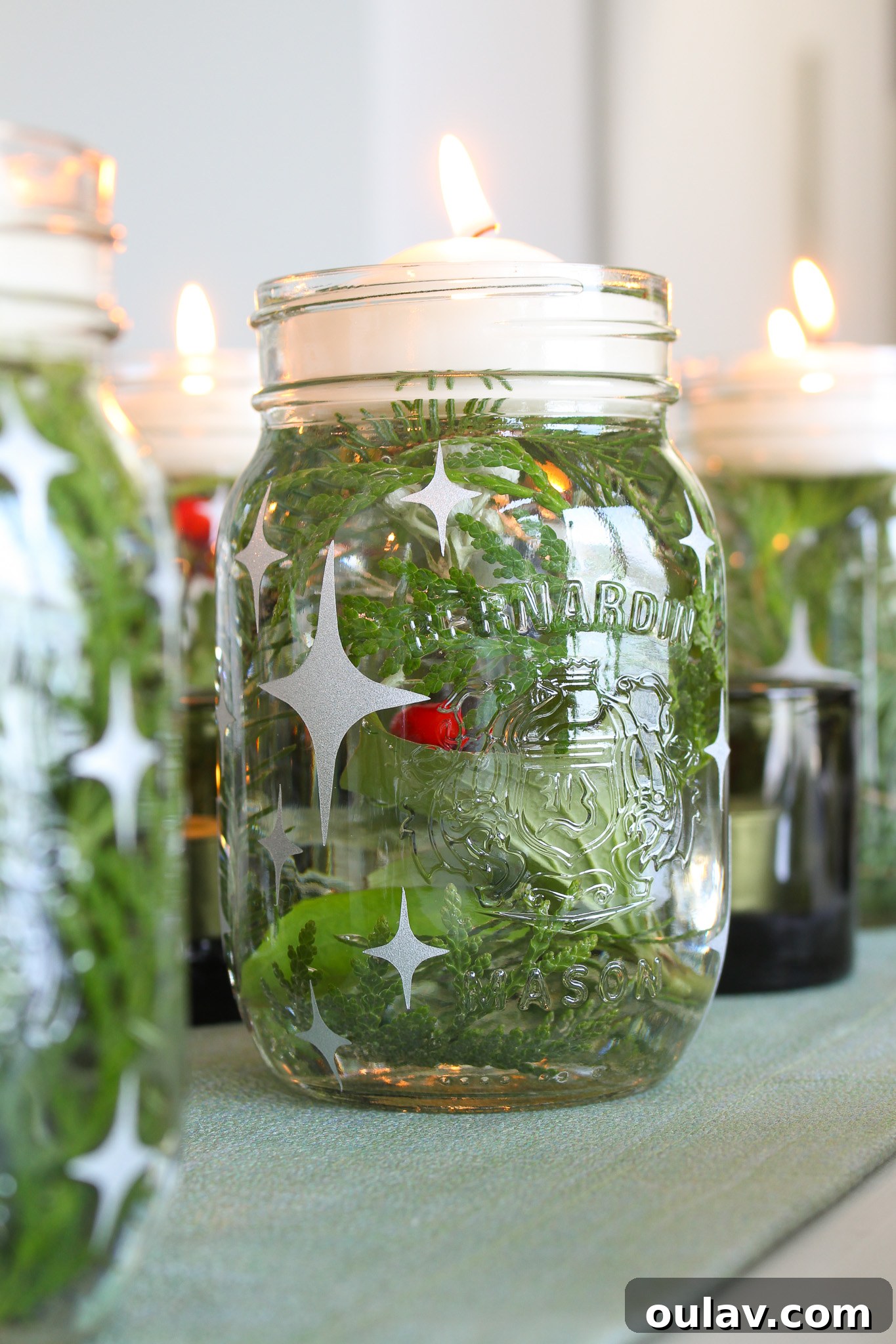 Stunning Cricut Etched Mason Jar Centerpieces 5 DIY Cricut Holiday Centerpiece with Etched Jars and Vinyl Stars