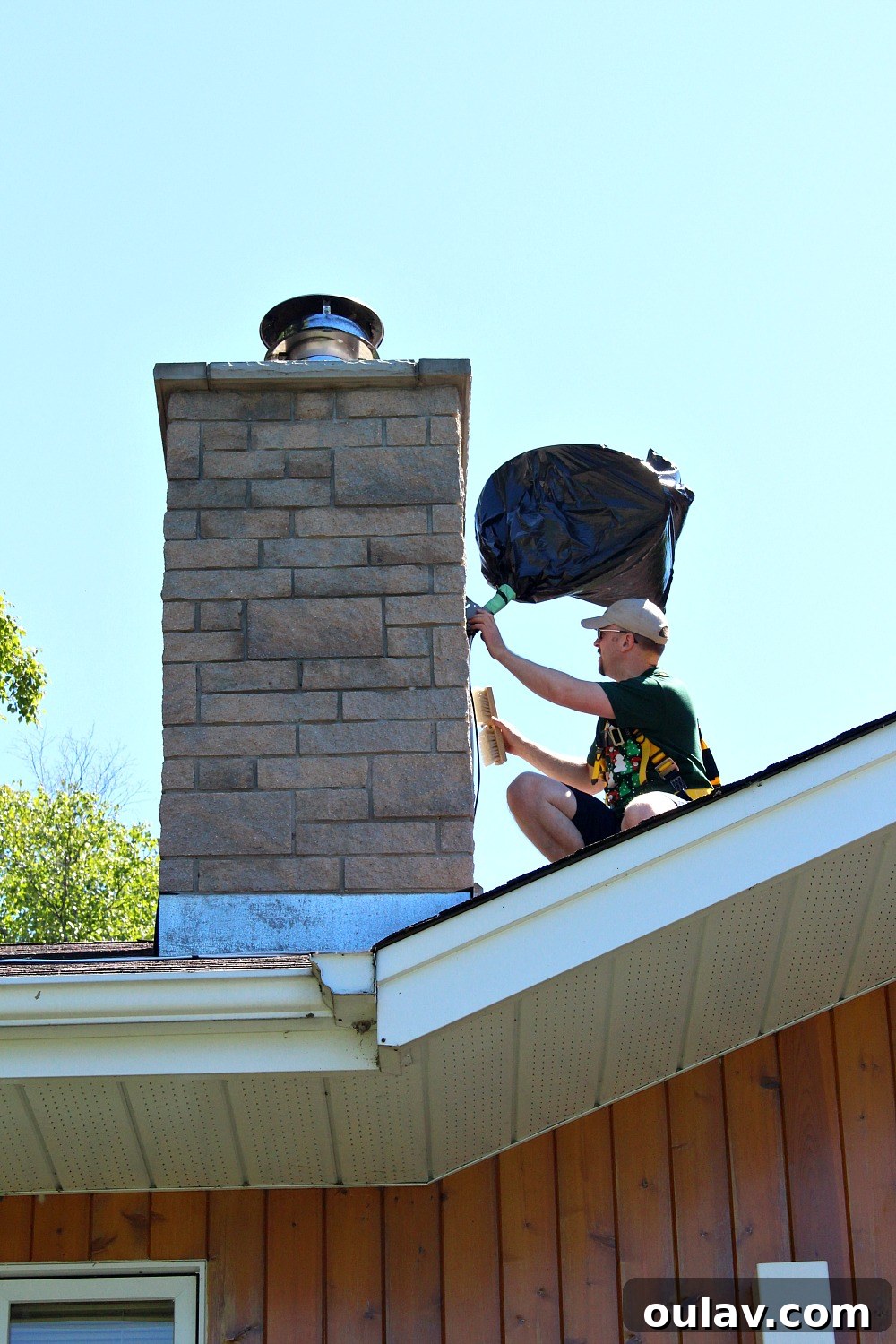 Charcoal Grey Stone Exteriors: A Safe Approach to Painting Your Chimney 8 Using Fall Arrest Gear for Painting a Chimney