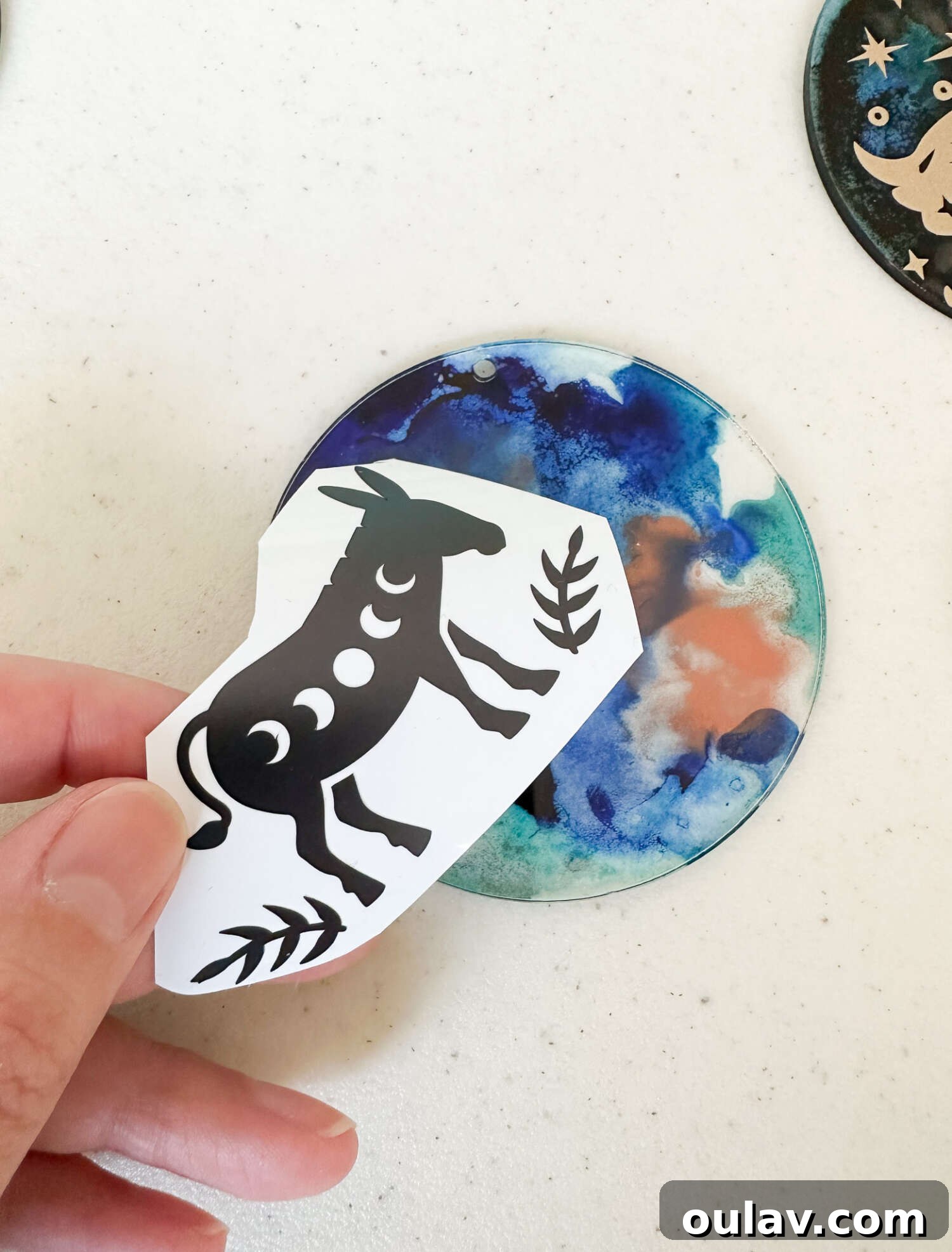 Cricut's Eerie Acrylic Disc Garland 18 How to Apply Cricut Vinyl to Acrylic Discs
