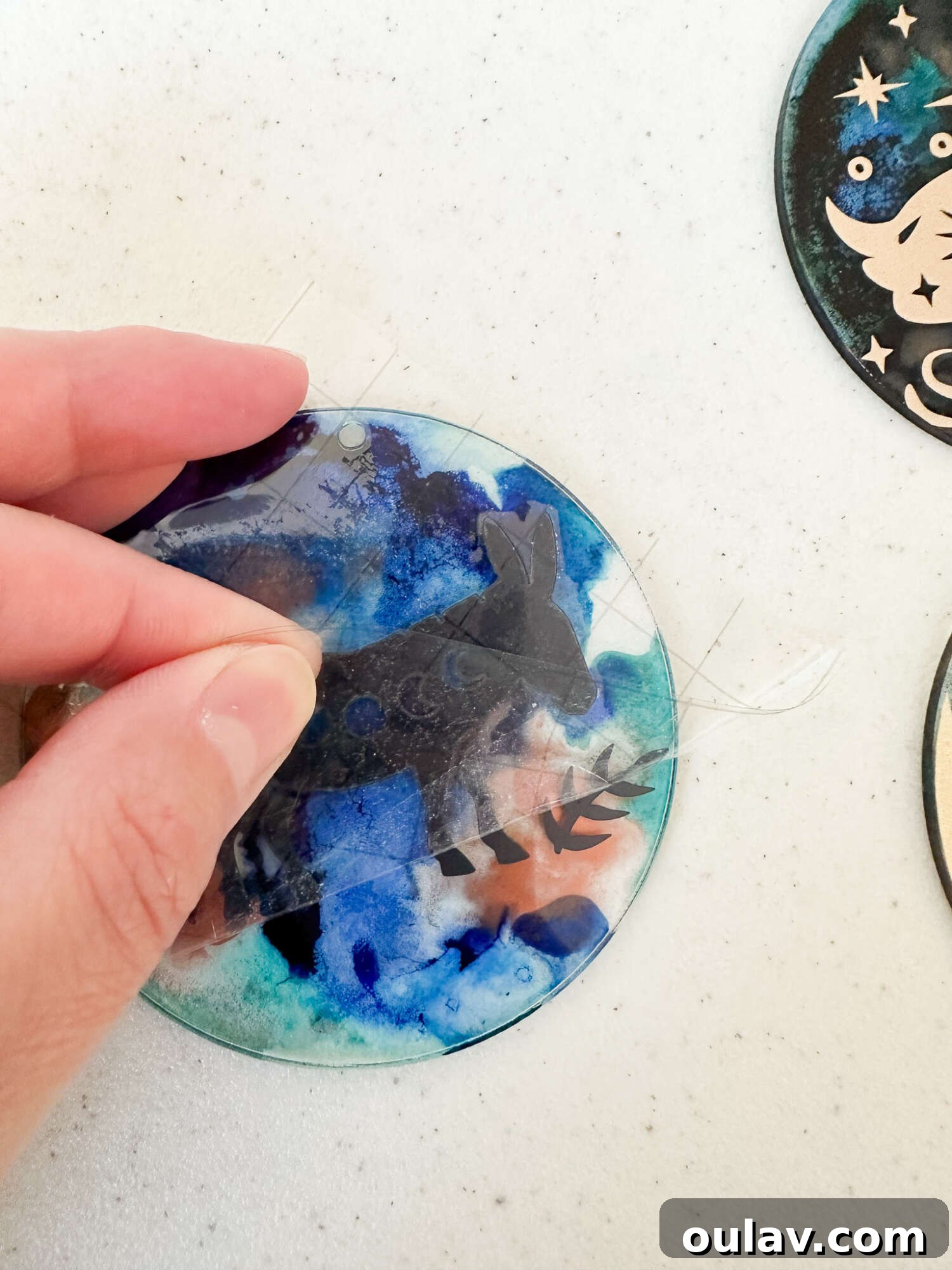 Cricut's Eerie Acrylic Disc Garland 21 How to Apply Cricut Vinyl to Acrylic Discs