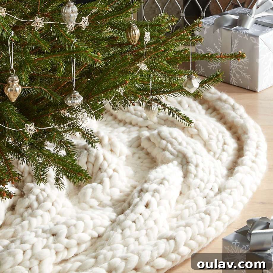 25 White Christmas Tree Decorations & Elegant Decor Finds 11 Cozy White Knit Christmas Tree Skirt