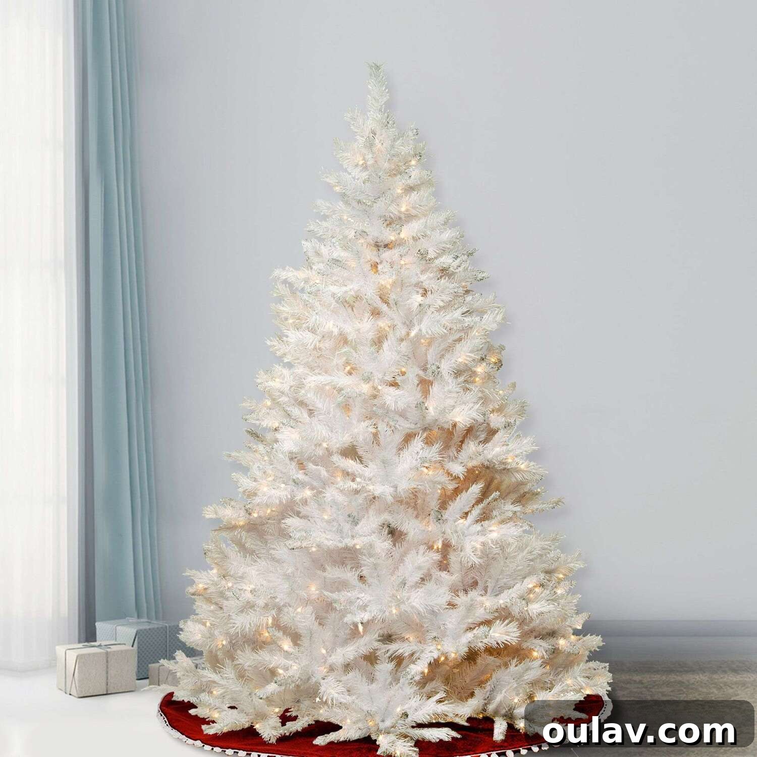 25 White Christmas Tree Decorations & Elegant Decor Finds 25 Pre-lit Faux Pine White Christmas Tree for a Winter Wonderland Theme