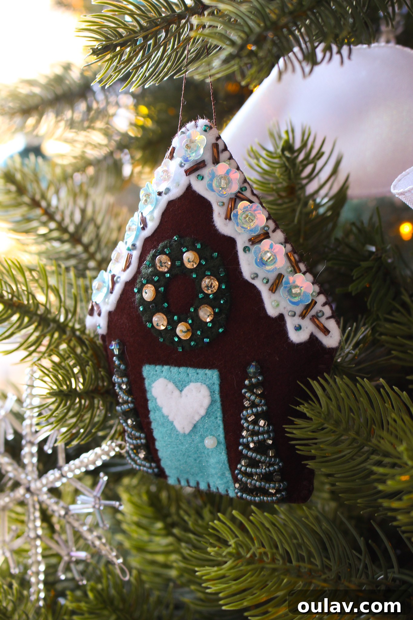 Choosing Realism Our King of Christmas Artificial Tree Review 6 A Majestic Christmas Tree Adorned with a Collection of Exquisite Handmade Ornaments