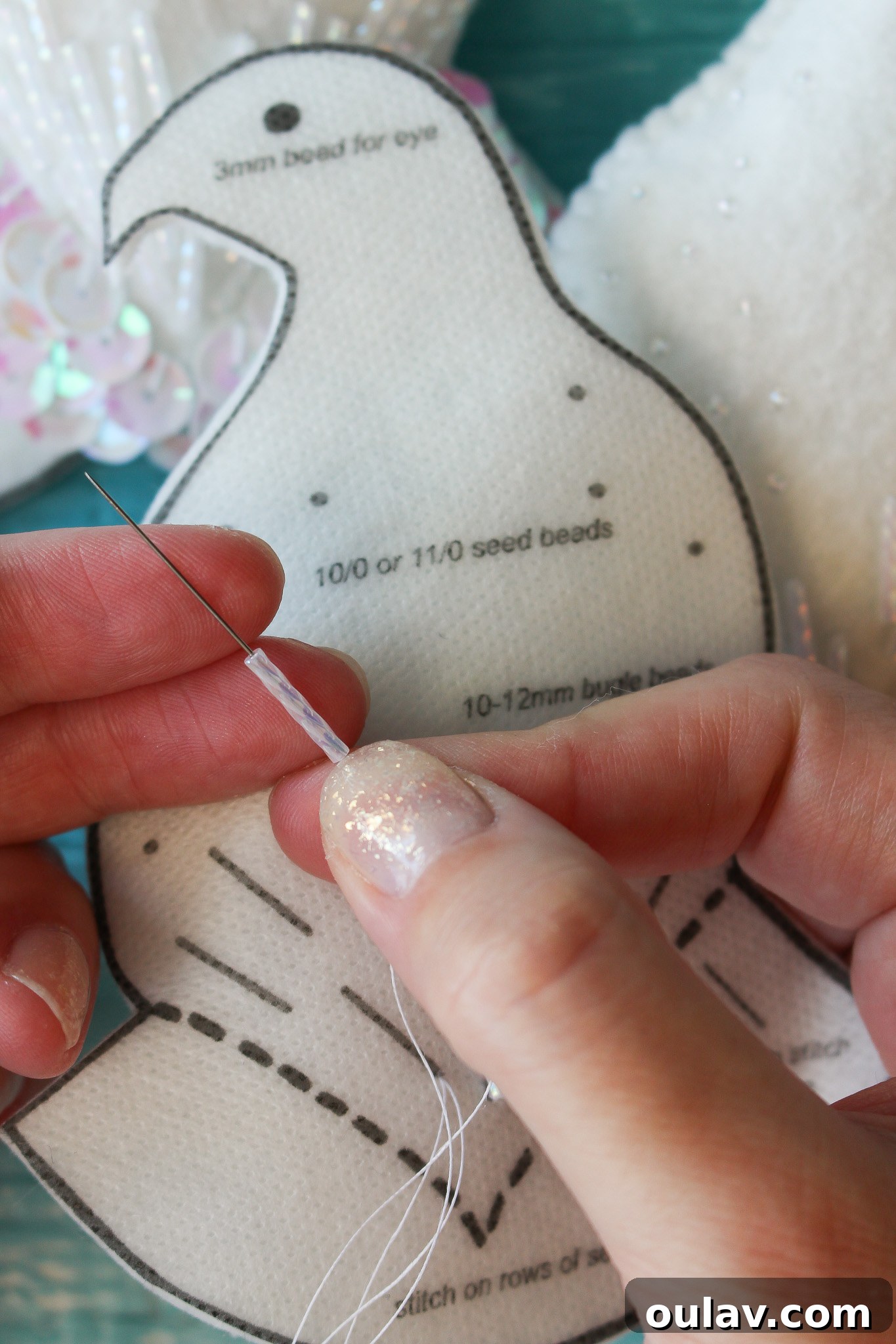 How to Stitch Beads onto Felt - Bead on needle