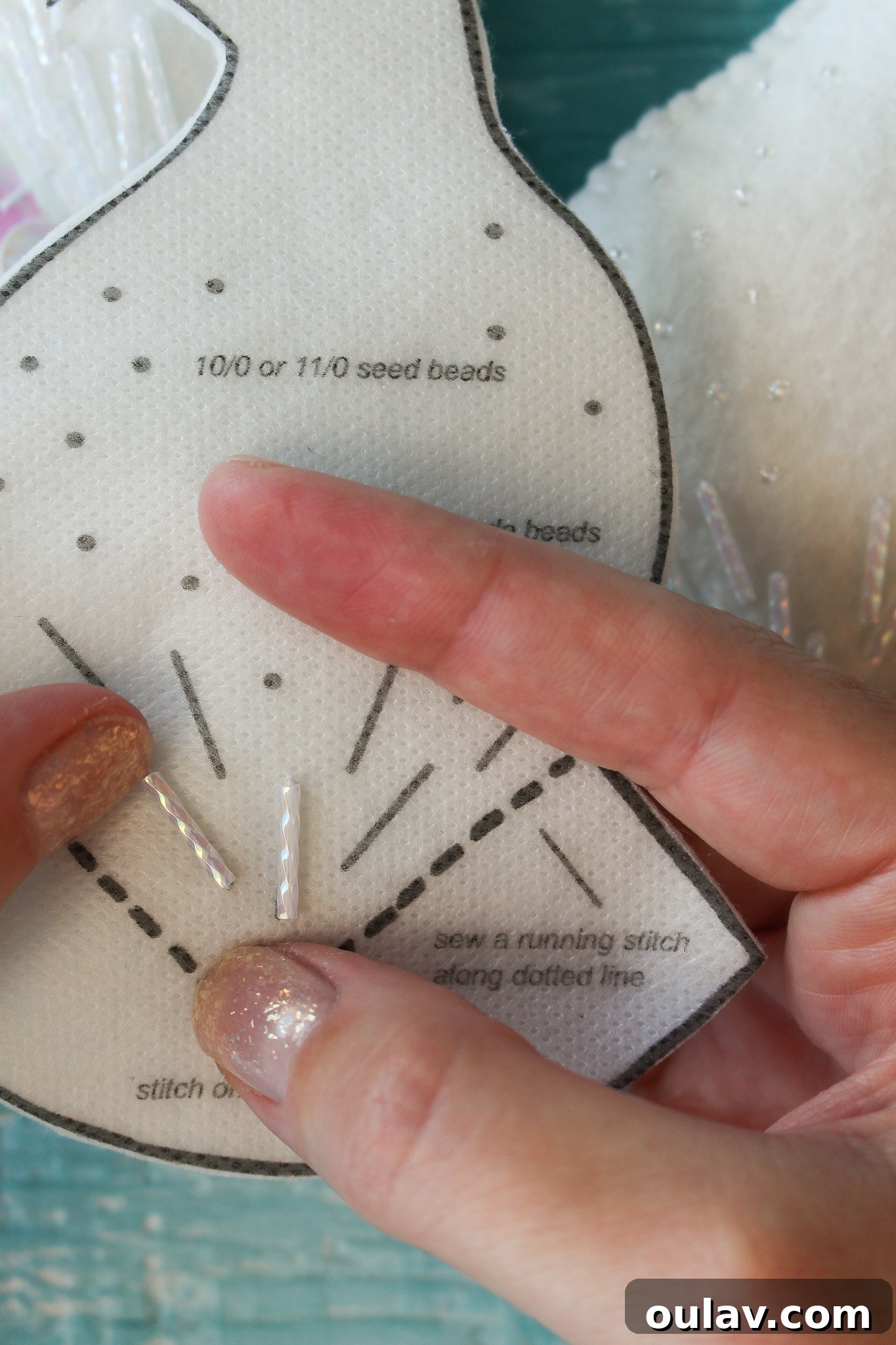 How to Stitch Beads onto Felt - Positioning bead