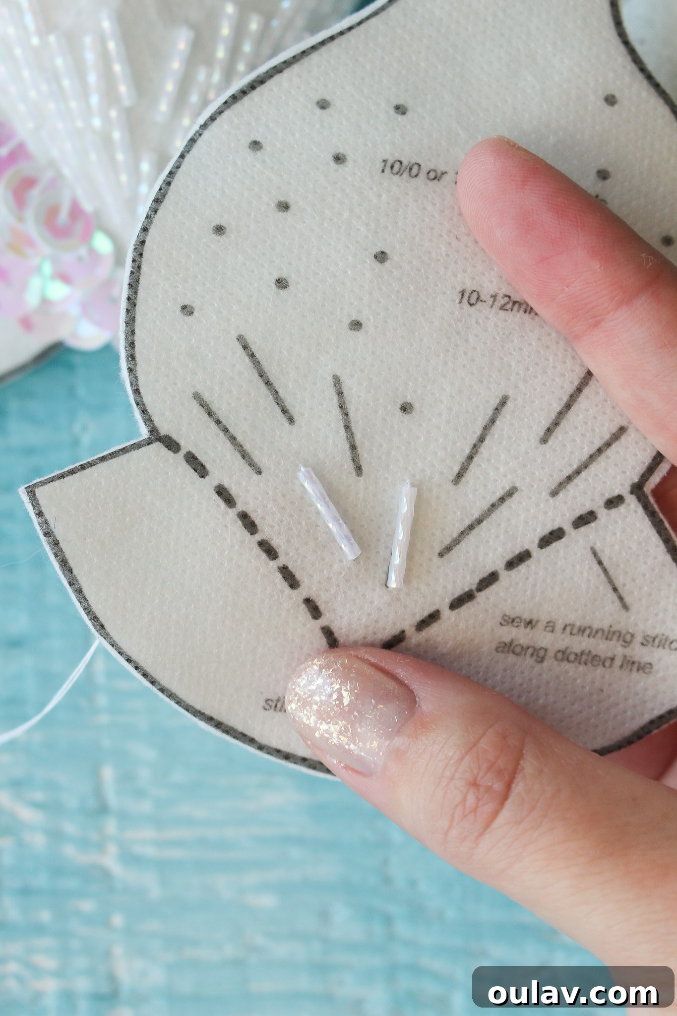 How to Stitch Beads onto Felt - Bead secured