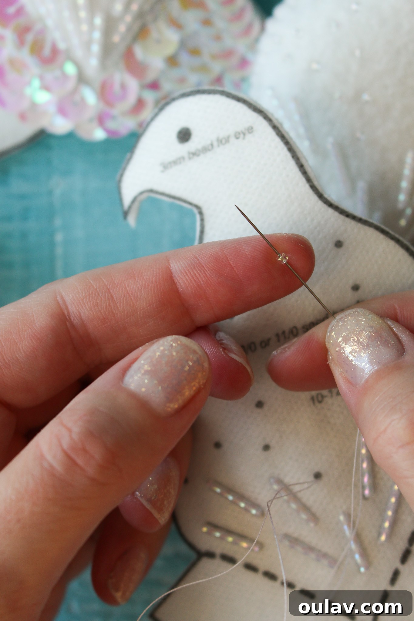 How to Stitch Beads onto Felt Ornament - More seed beads