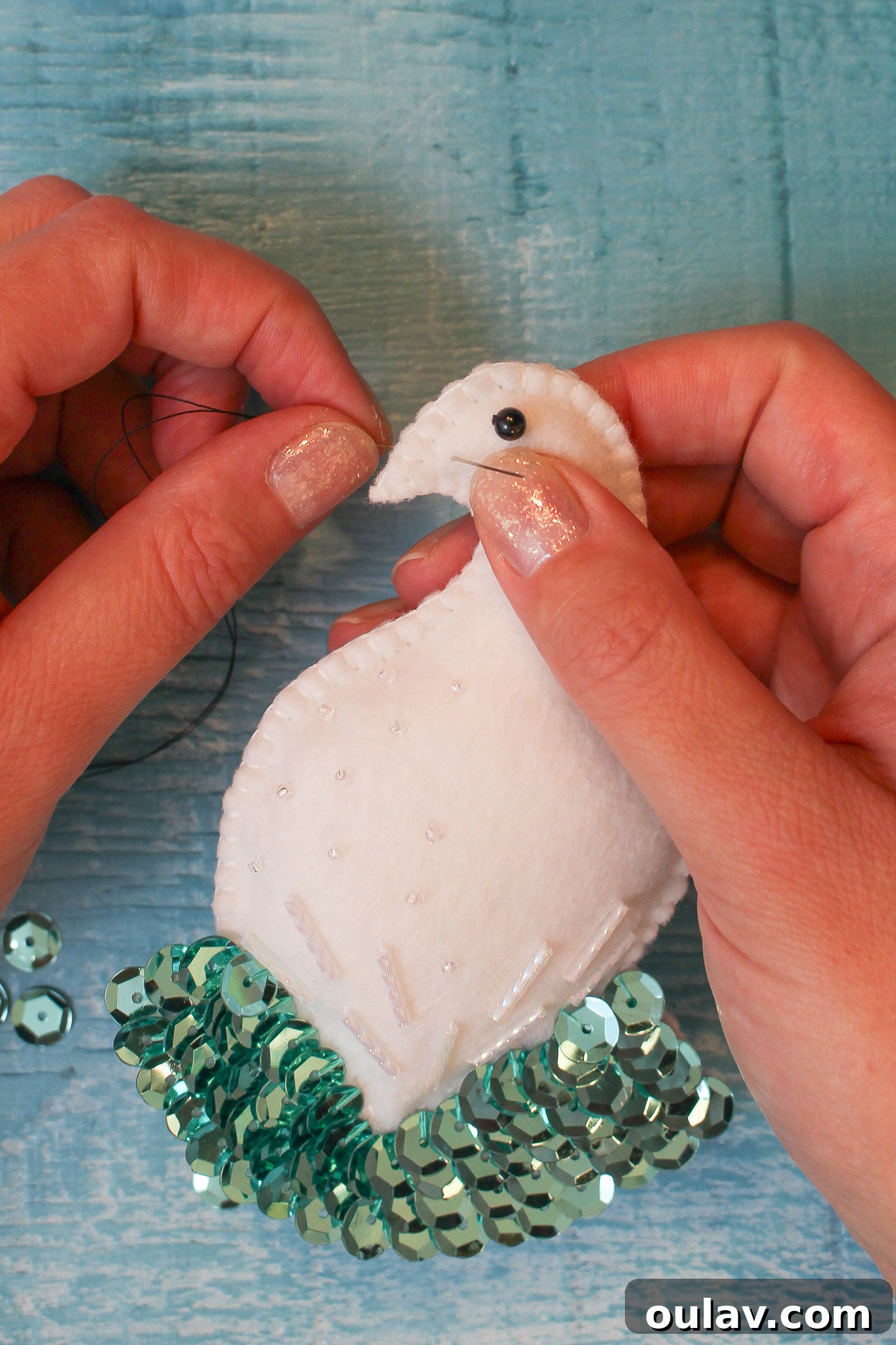 Stitch a Beak onto Felt Bird Ornament - Starting the beak