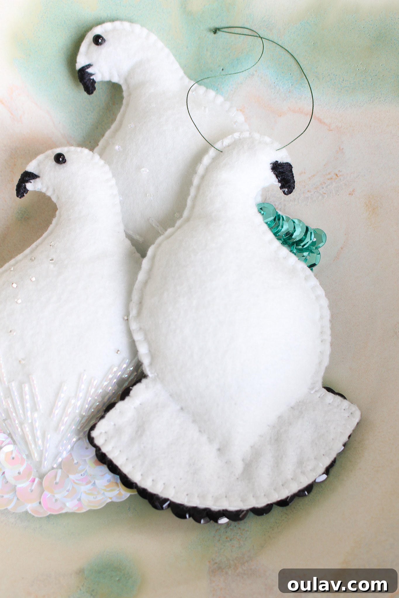 How to Hang Felt Ornaments without a Ribbon - Green thread loop