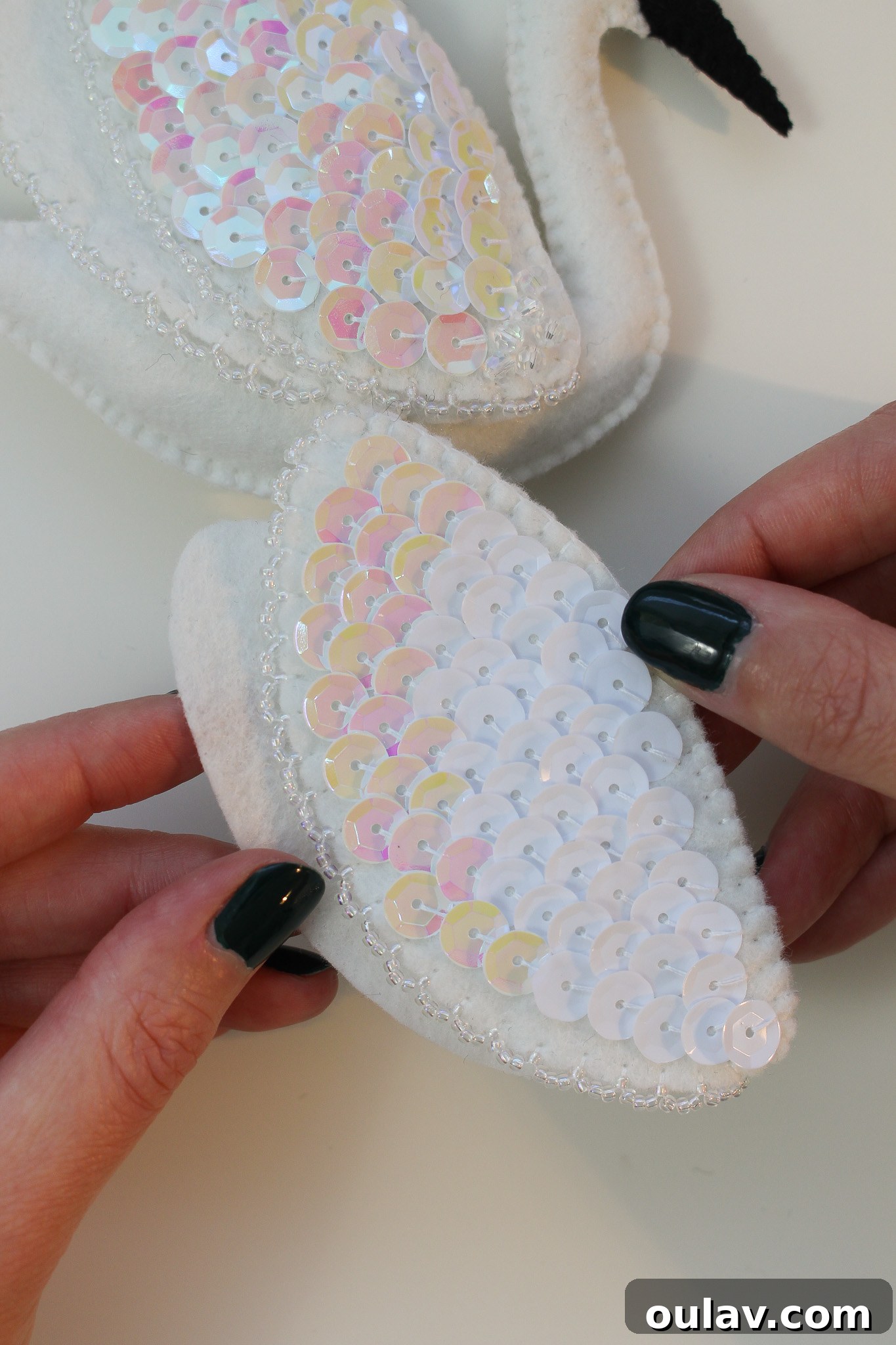 Stitch Your Own Felt Swan Ornament 28 Adding decorative beads to the edge of felt