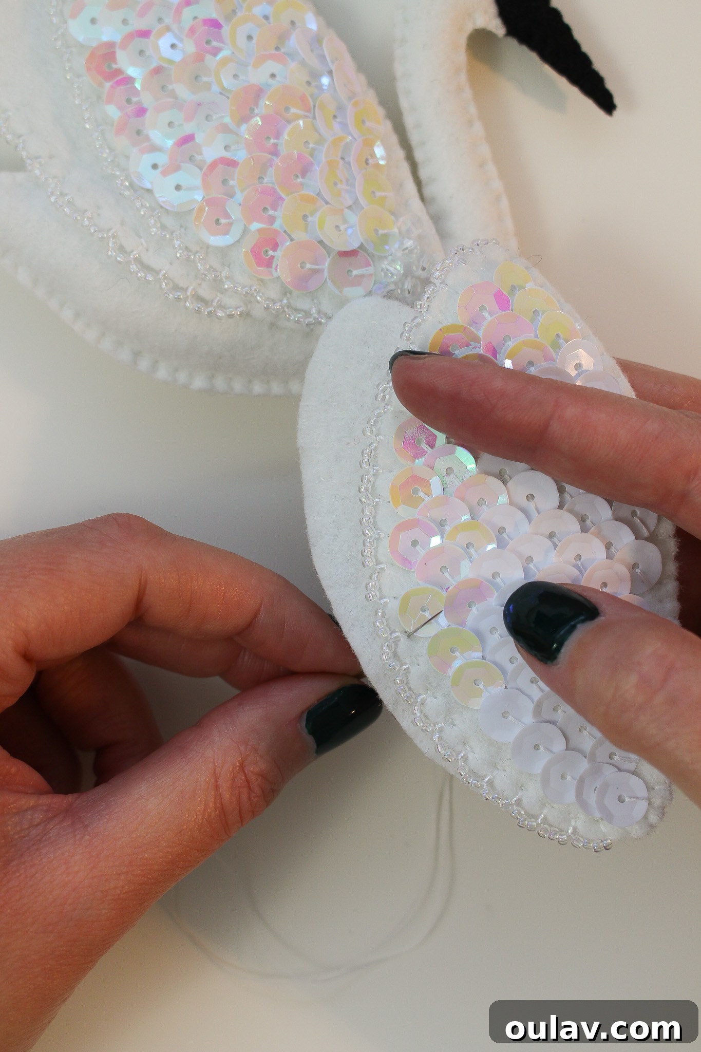 Stitch Your Own Felt Swan Ornament 31 Process of making a felt ornament, showing stuffing