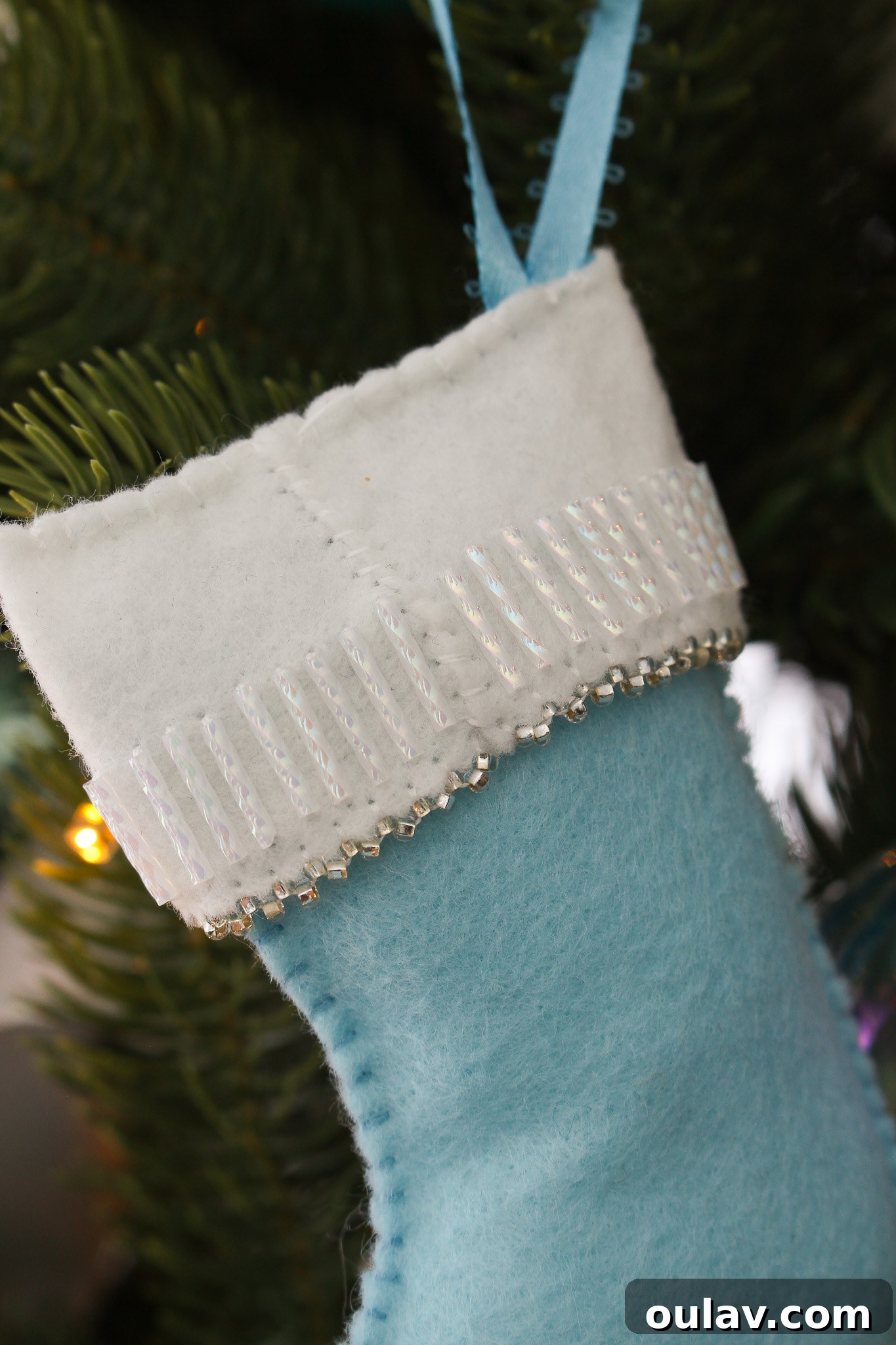 Charming Felt Mitten Garland 11 DIY Beaded Felt Ornament Idea: Another angle of the beautifully embellished felt stocking ornament.
