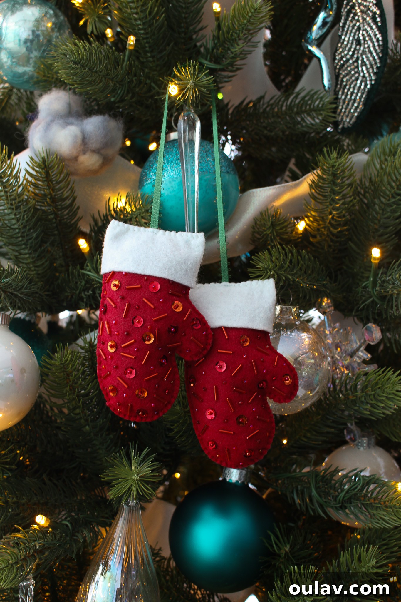 Charming Felt Mitten Garland 8 DIY Mittens on a String Ornament Tutorial: Another angle of the completed ornaments, perfect for holiday decorating.