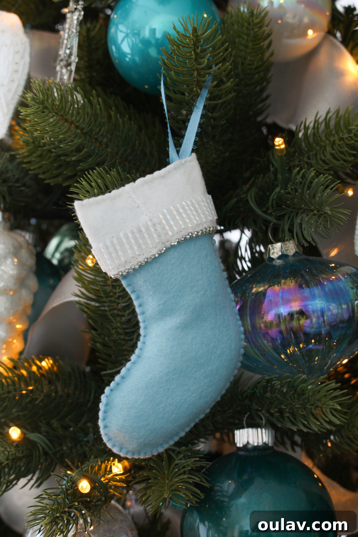 Charming Felt Mitten Garland 10 DIY Beaded Felt Stocking Pattern: The reverse side of the felt stocking, emphasizing clean stitching and form.