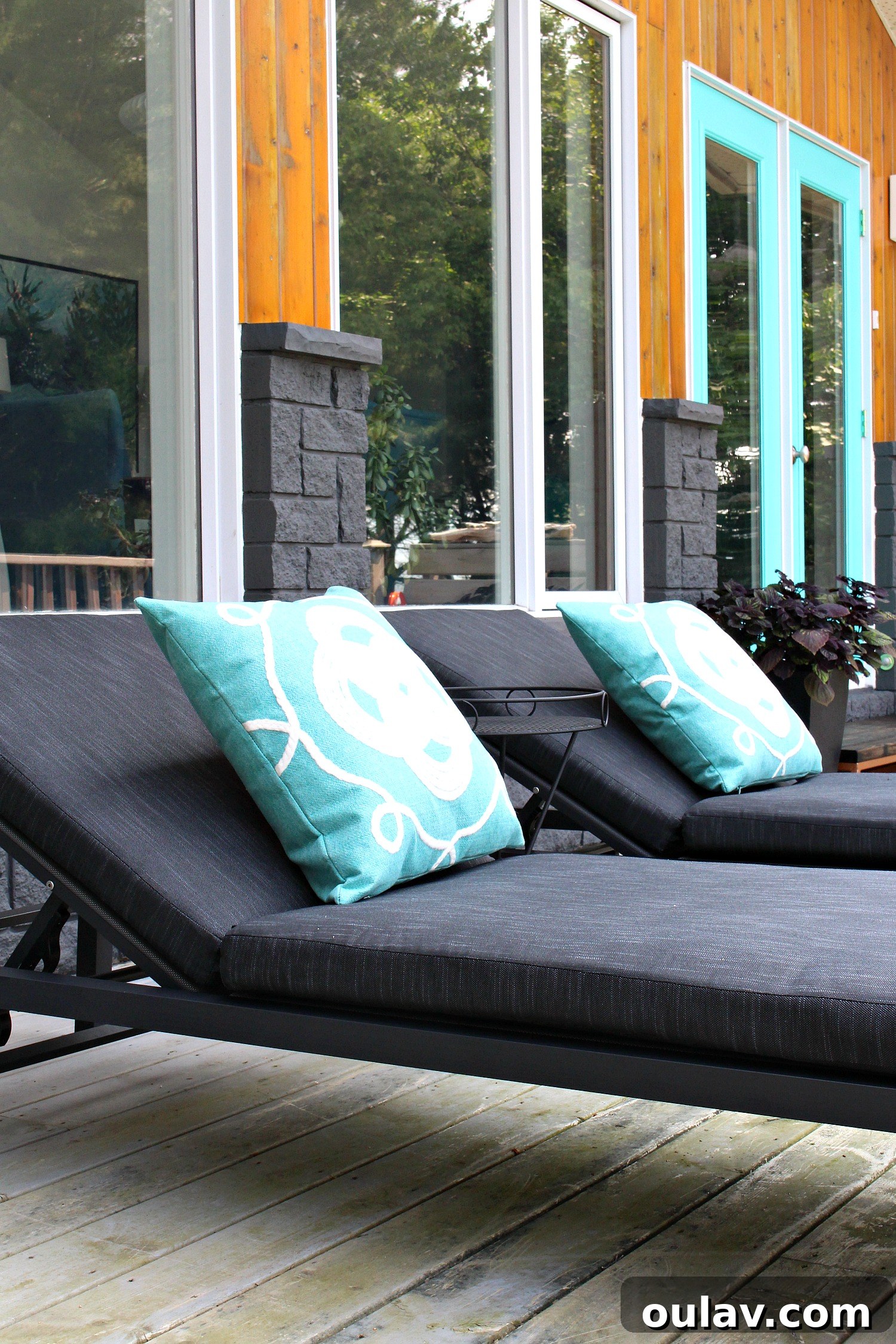Throw Pillows My Family Legacy 4 A set of modern patio loungers elegantly arranged with comfortable outdoor pillows, creating an inviting and stylish exterior living space for relaxation.