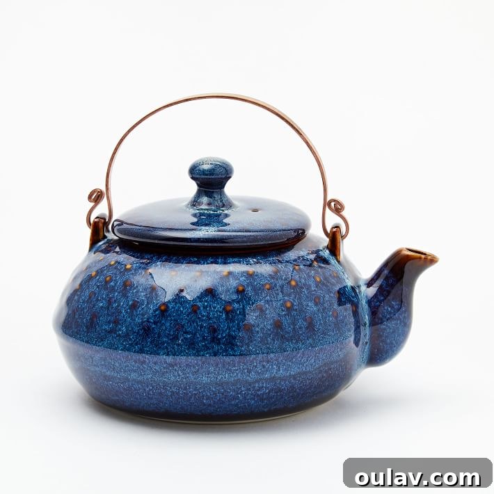 Holiday Haven: 25 Delightful Gifts for Homebodies 11 A traditional Japanese rabbit-shaped teapot, elegantly presented for a tea lover's home.