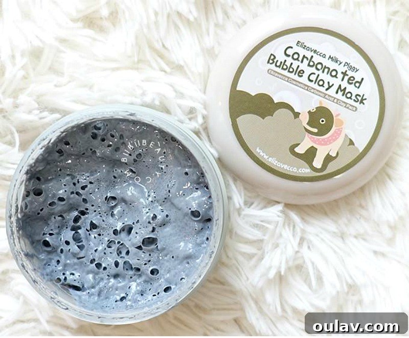 Holiday Haven: 25 Delightful Gifts for Homebodies 29 A carbonated foaming face mask bubbling on skin, next to a jar of the mask product, for home spa experiences.