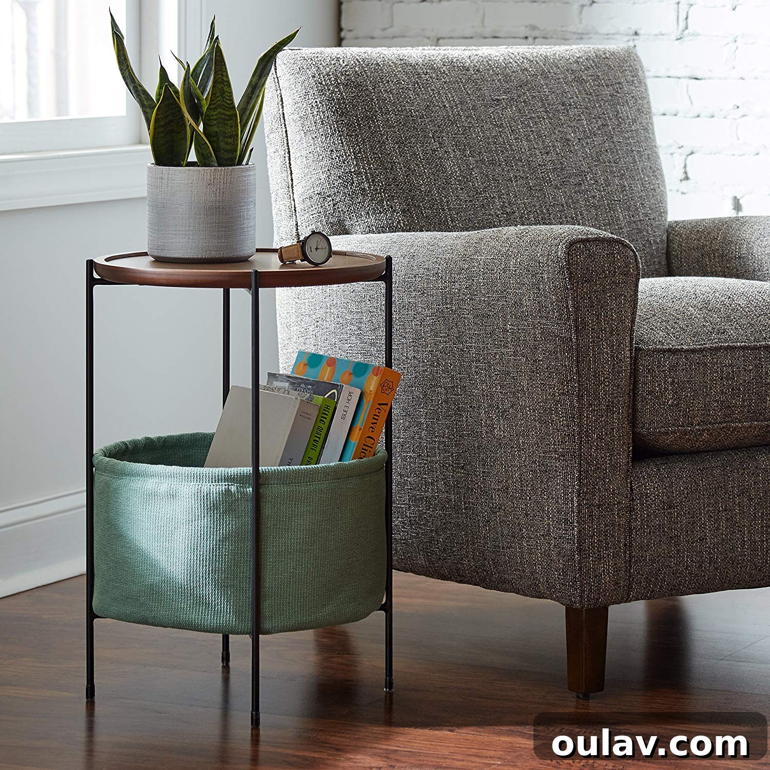 Holiday Haven: 25 Delightful Gifts for Homebodies 30 A stylish walnut-topped side table with a turquoise storage basket, organizing living room essentials.
