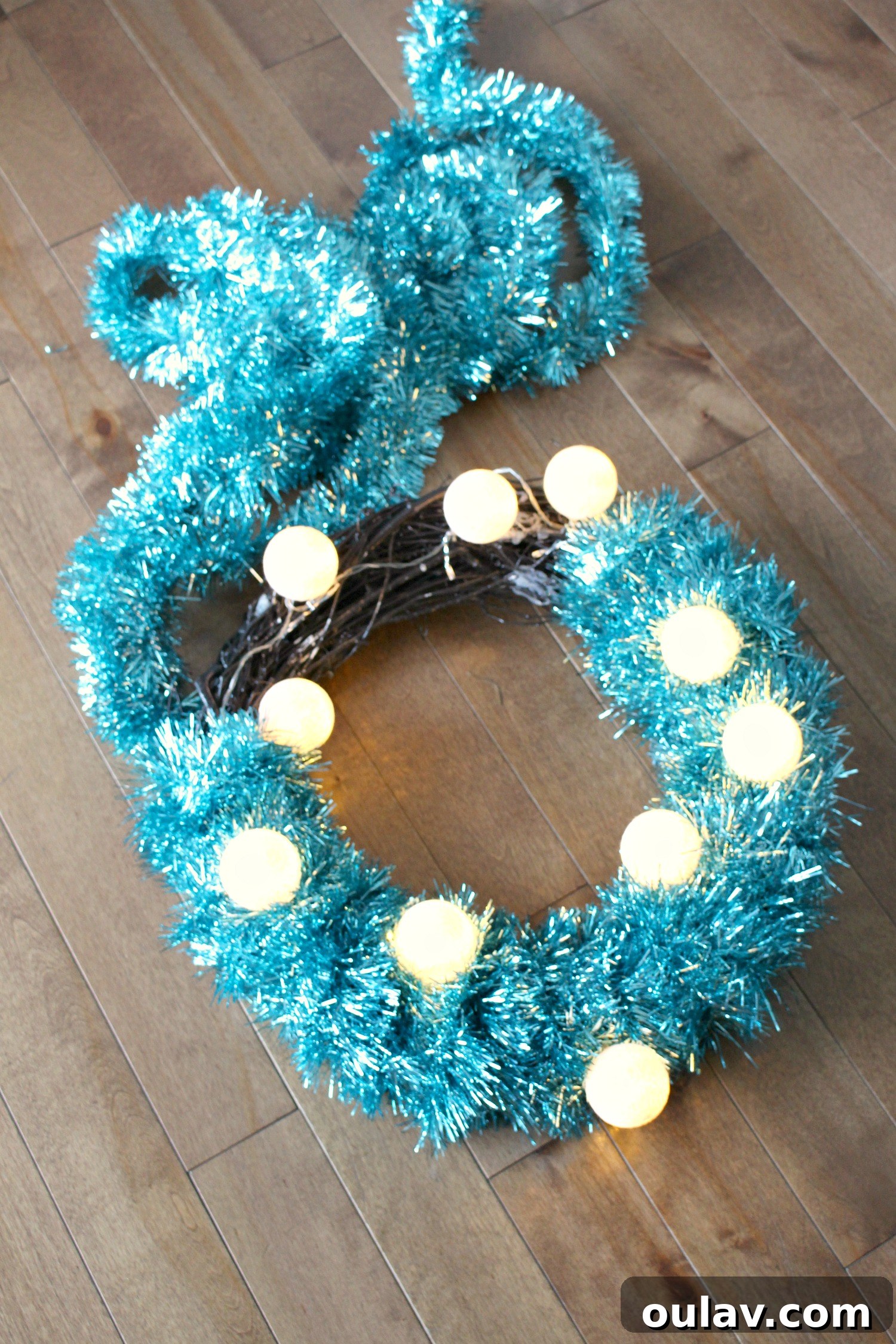 Retro Sparkle: Craft Your Own Tinsel Wreath 5 Attaching Lights to Wreath Form for DIY Tinsel Wreath