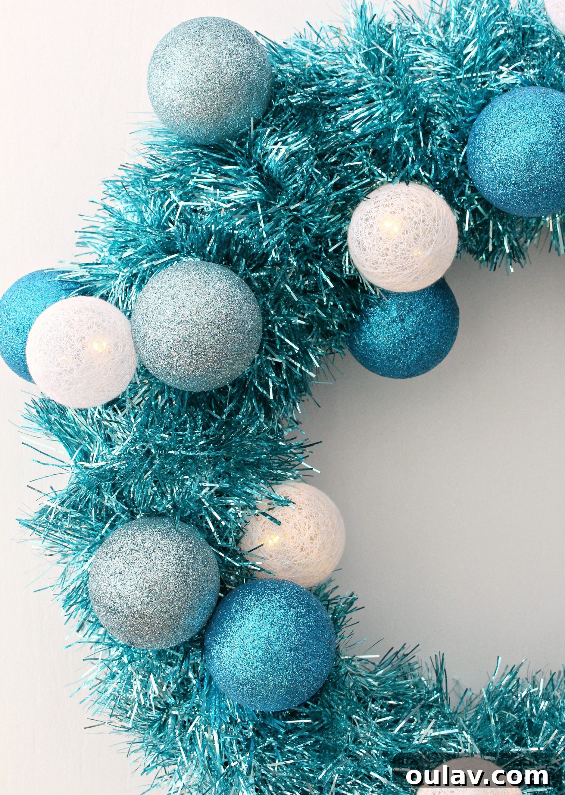 Retro Sparkle: Craft Your Own Tinsel Wreath 6 Wrapping Tinsel Around Wreath for Retro DIY Christmas Decor