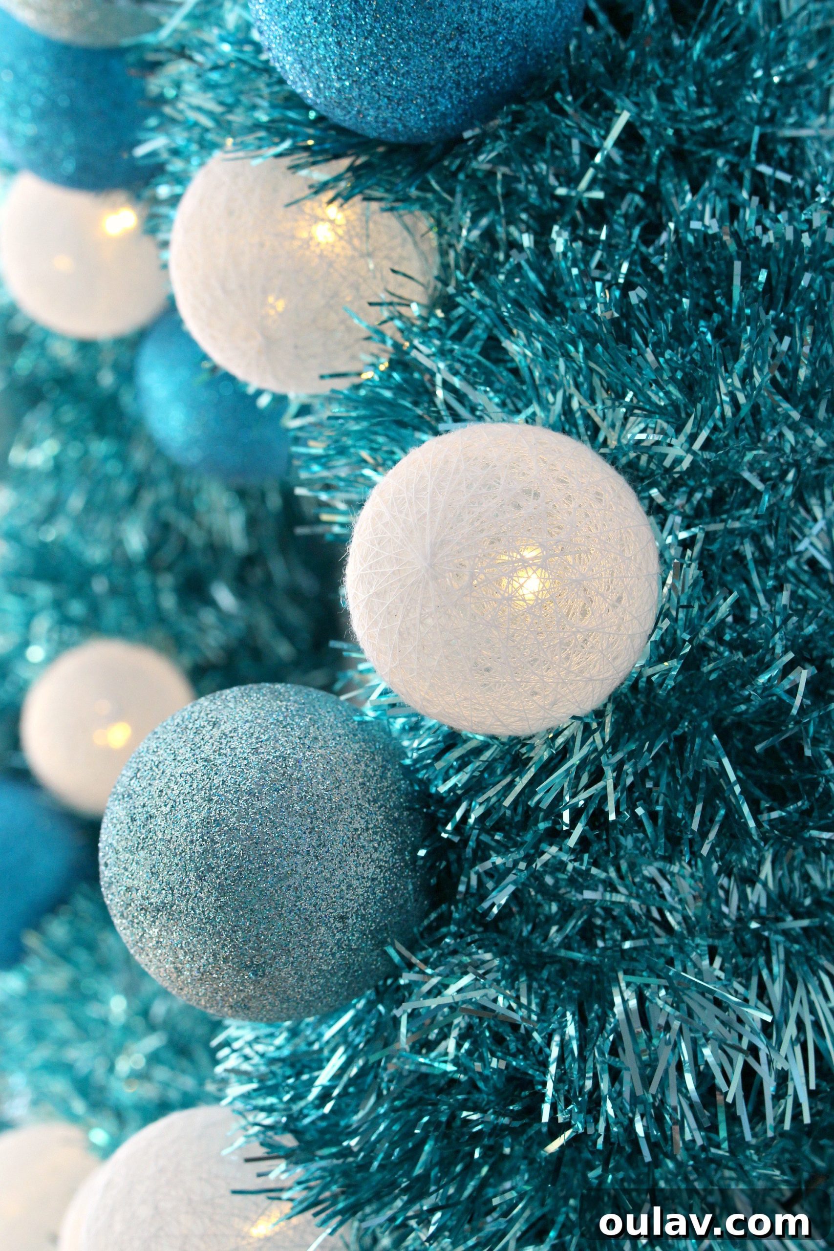 Retro Sparkle: Craft Your Own Tinsel Wreath 7 Adding Sparkly Ornaments to DIY Tinsel Wreath for Extra Glamour