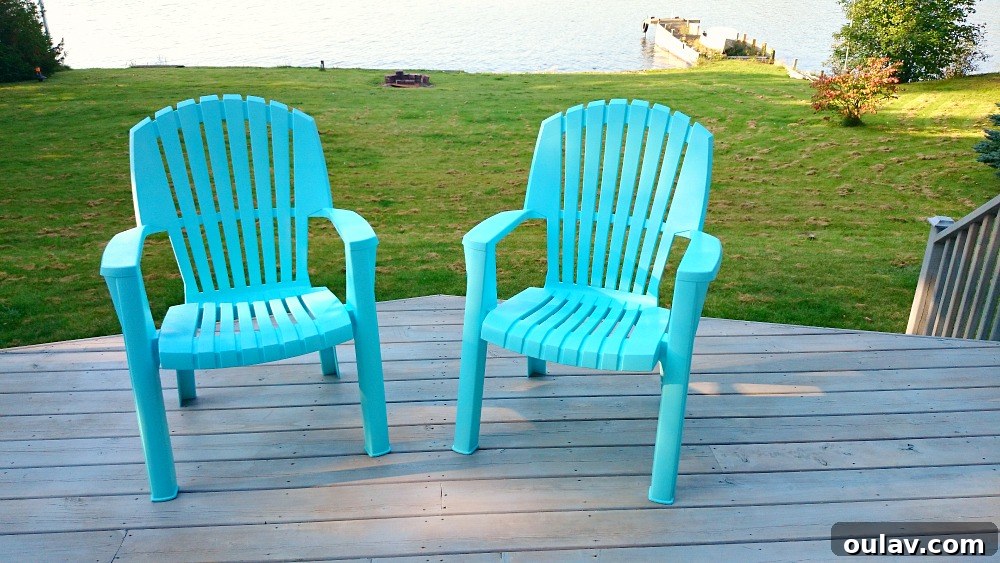 Give Your Plastic Lawn Chairs a Spray Paint Makeover 2 Two vibrant aqua plastic lawn chairs after being spray painted, looking new and modern