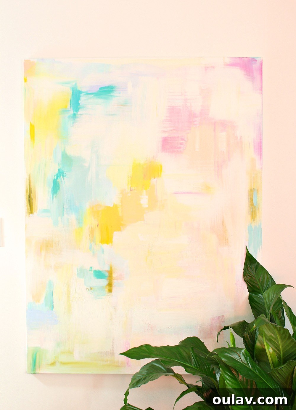 DIY Abstract Art Tutorial Featured in a Magazine Once More 4 Completed DIY Abstract Painting Hanging on a Wall, Tilted