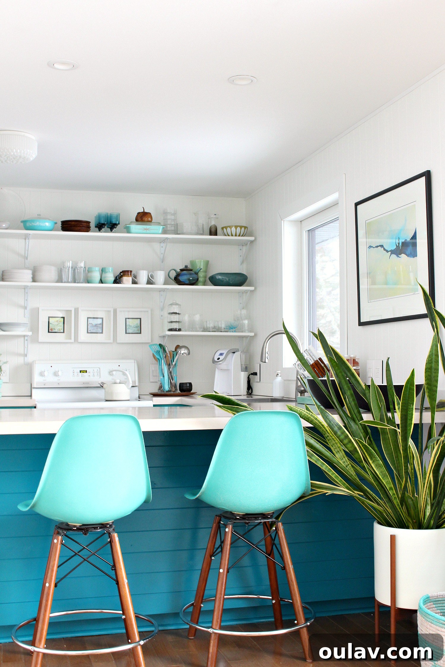 Transform Your Kitchen Cabinets Tongue and Groove Paneling and a Fresh Teal Hue 17 Completed Teal Kitchen Cabinet Backs with Paneling