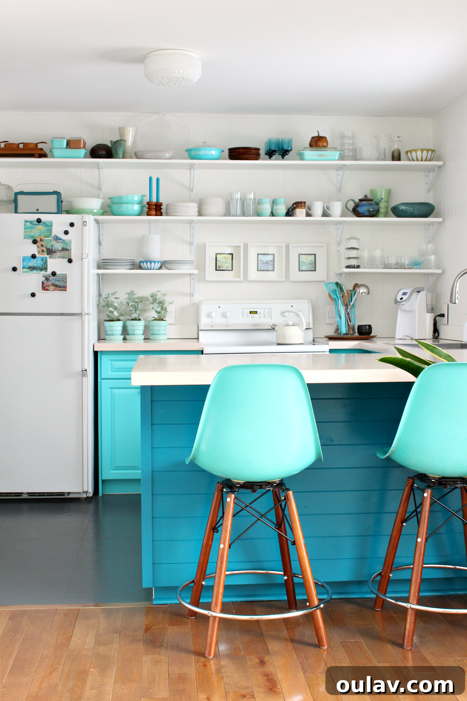 Transform Your Kitchen Cabinets Tongue and Groove Paneling and a Fresh Teal Hue 7 Adding Paneling on Kitchen Cabinet Backs for Texture and Style